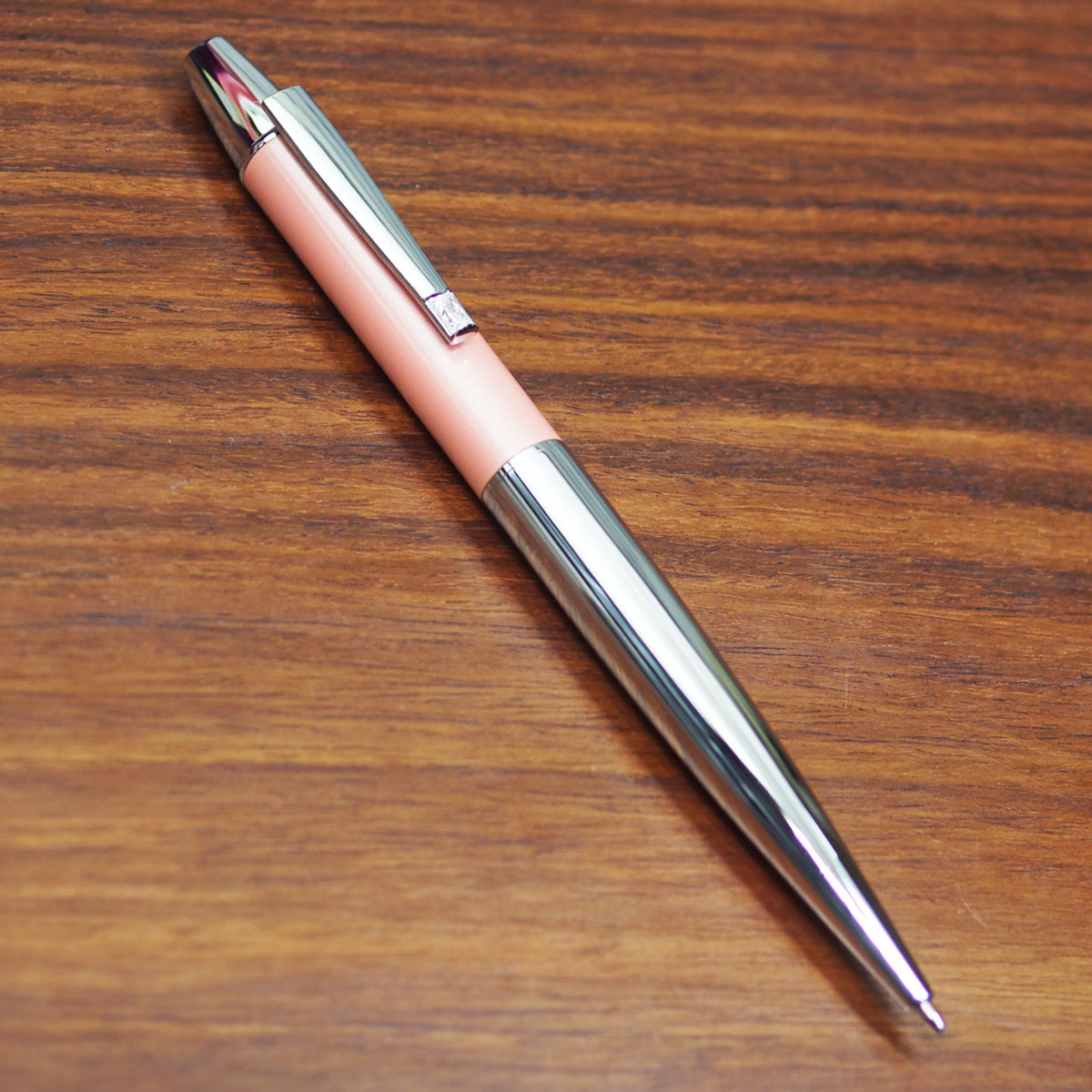 Hero SH202 Silver Color Body With Peach Color Cap And Clip On Stone Medium Tip Twist Type Ball Pen SKU 23533