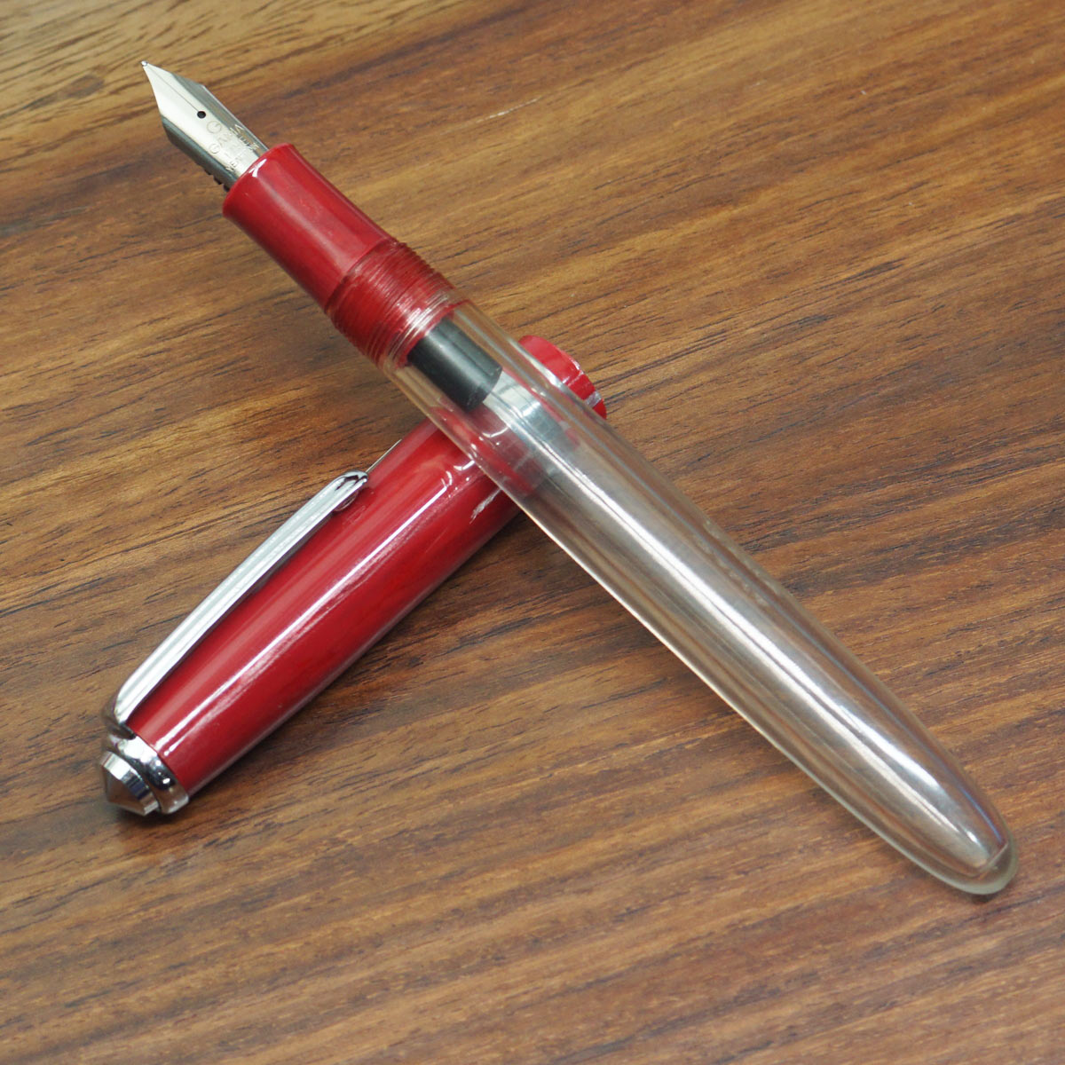 Gama Transparent Body With Red Color Acrylic Cap And Silver Clip Fine Nib Eye Dropper Model Fountain Pen SKU 23555