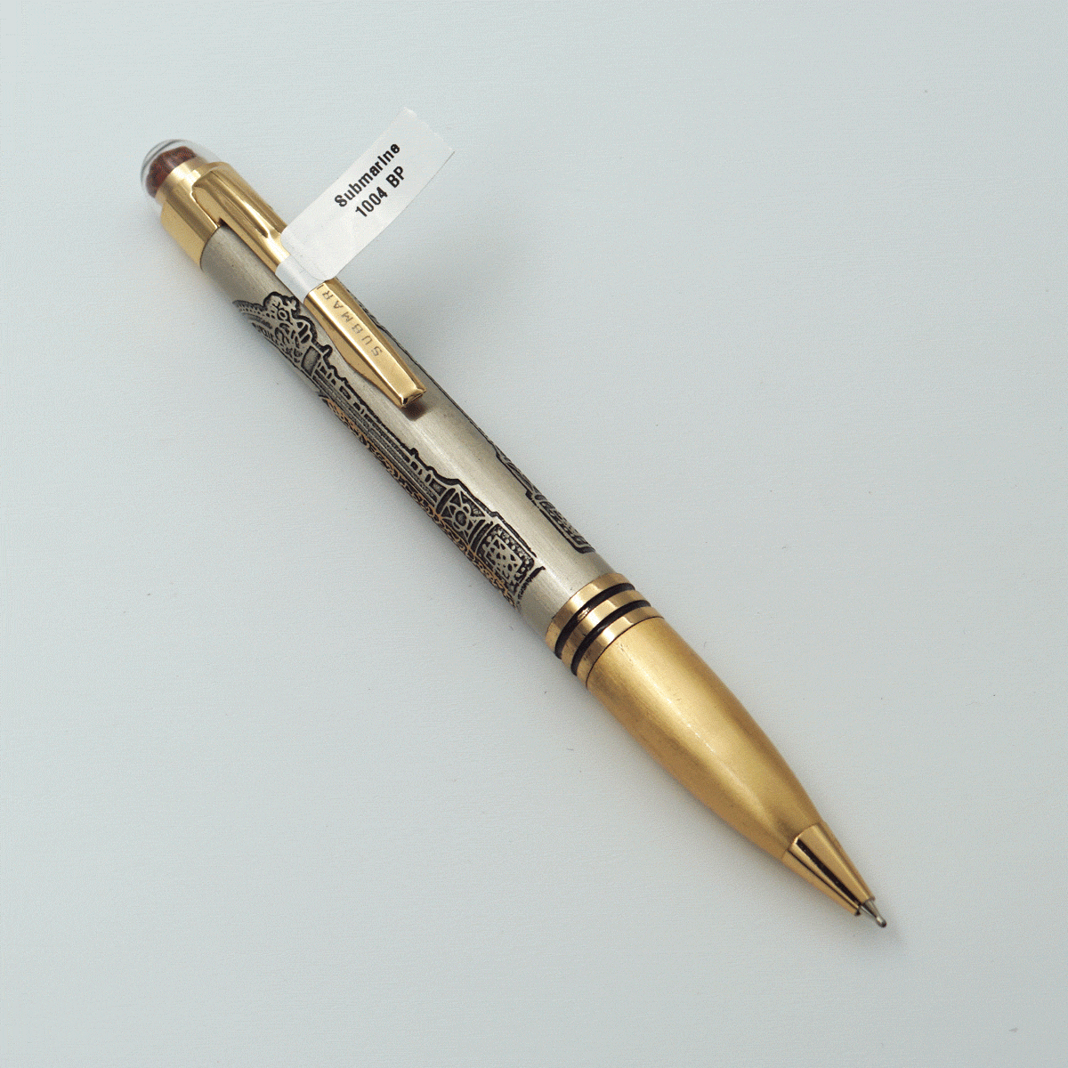 Submarine 1004 Perumal Rudraksha Design Body With Golden Color Clip Fine Tip Twist Type Ball Pen SKU 23650