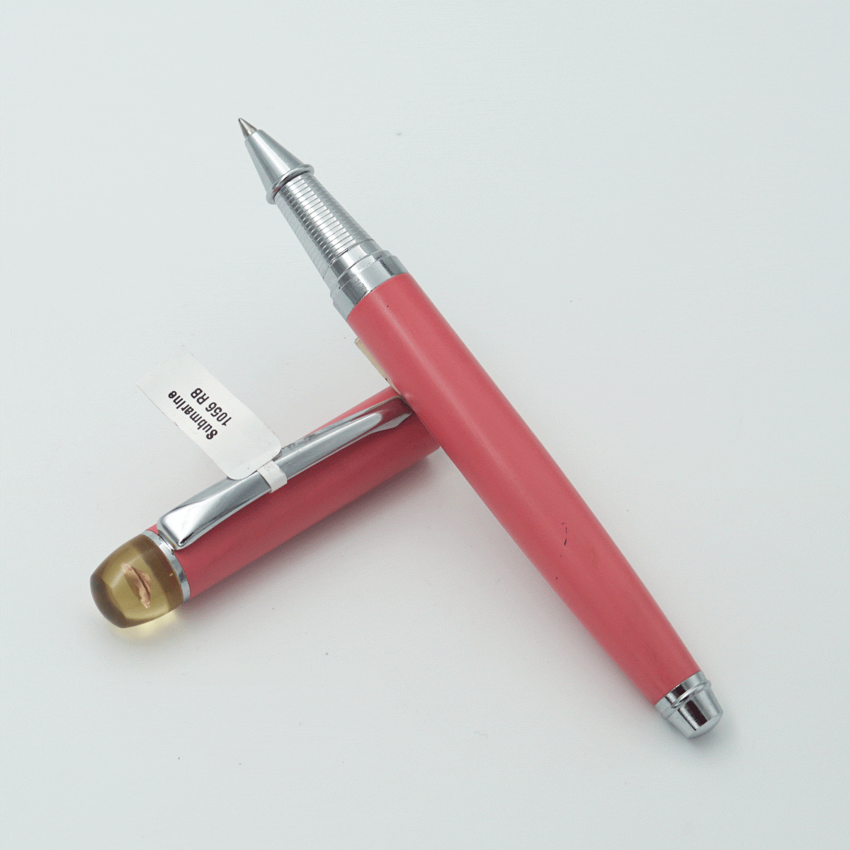 Submarine 1056 Peach Color Body With Silver Color Clip and Diamond On The Cap Medium Tip Roller Ball pen SKU 23670