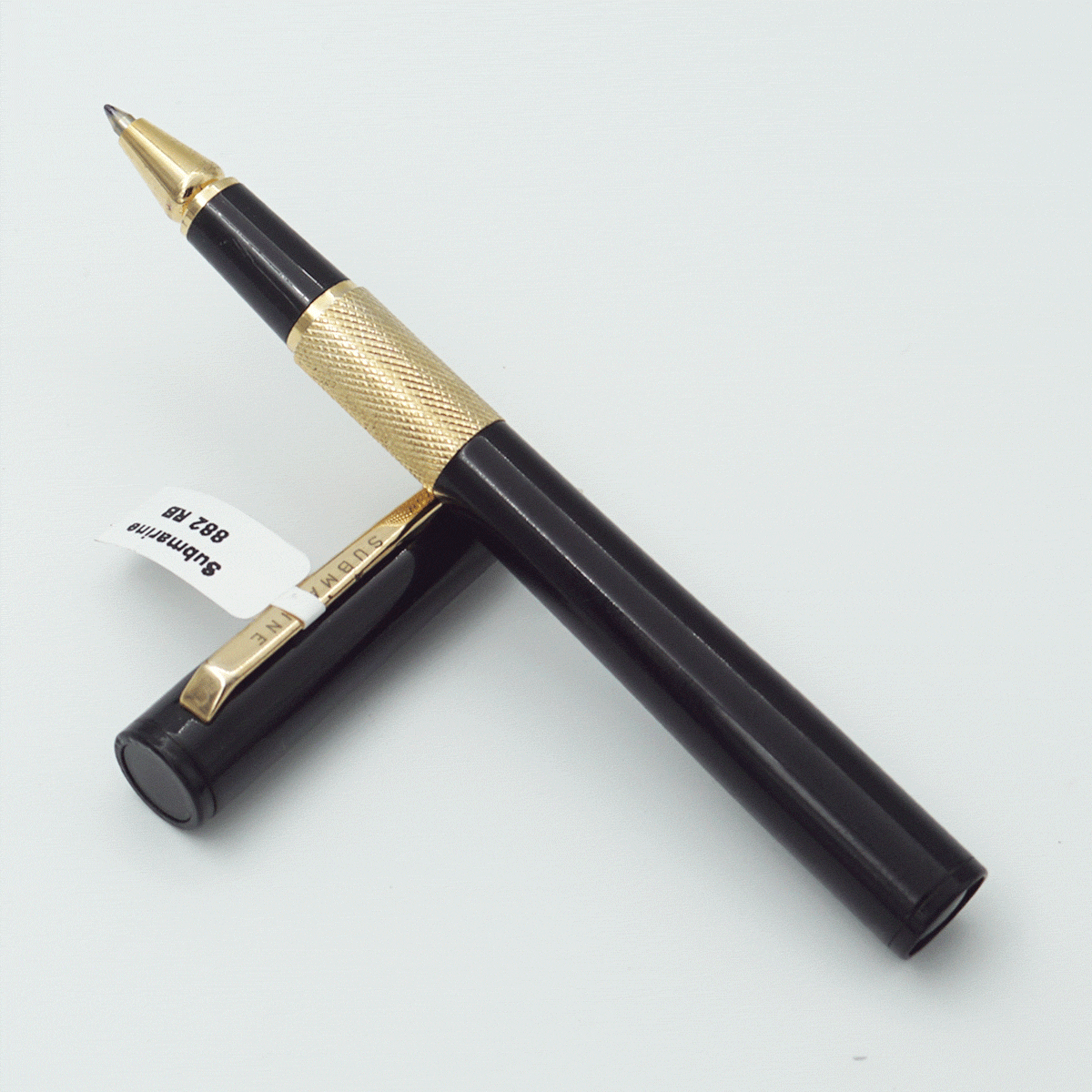 Submarine 882 Black Color Body With Gold Trims And Golden Color Clip Medium Tip Roller Ball Pen SKU 23772