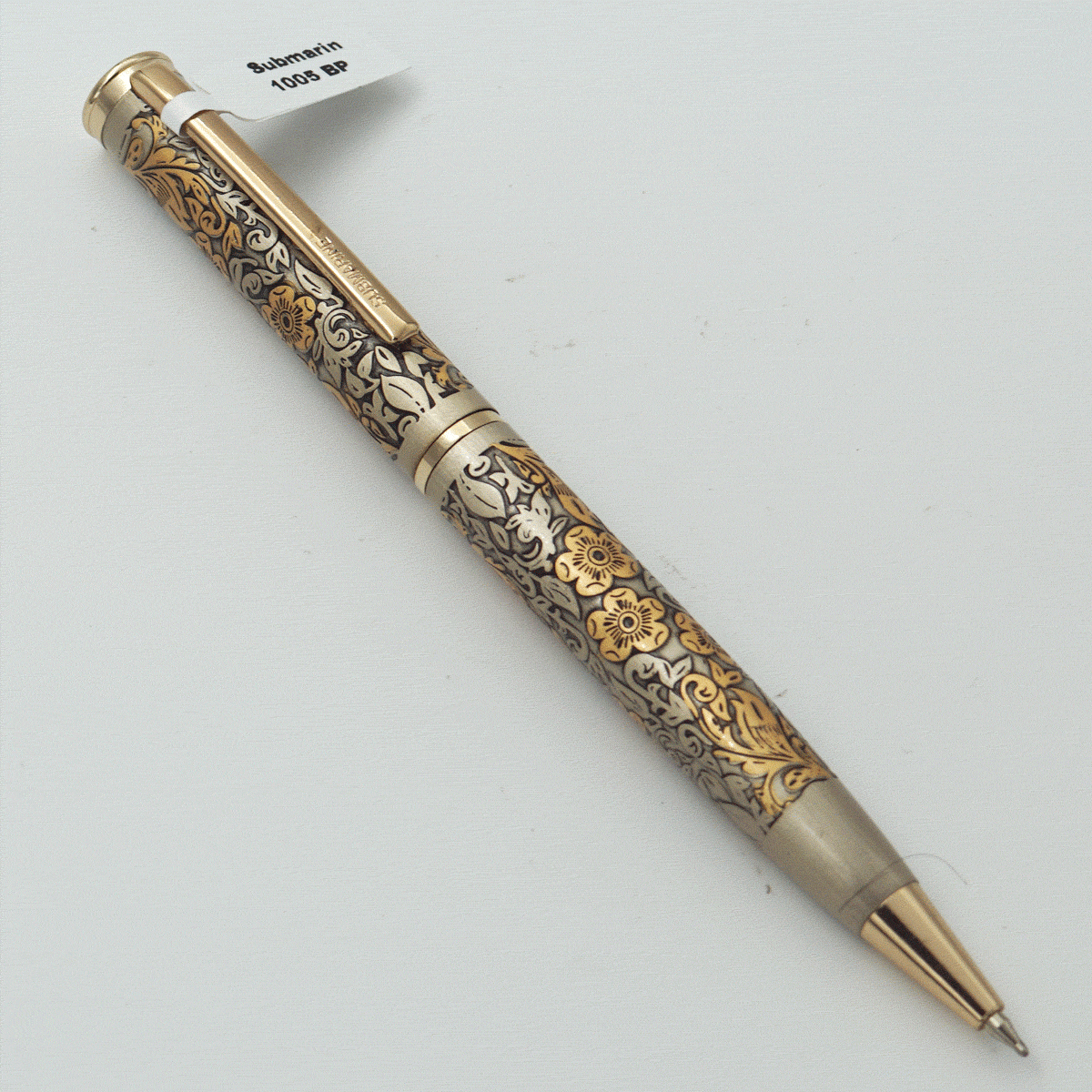 Submarine 1005 Gold Color Flower Designed Body With Cap And Gold Clip Fine Tip Twist Type Ball Pen SKU 23787