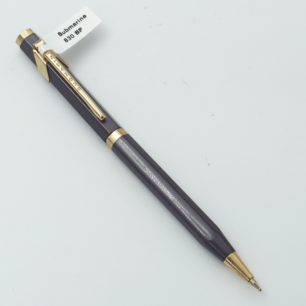 Submarine 830 CARAN D Grey Color Body With Grey Color Cap And Gold Clip Fine Tip Twist Type Ball Pen SKU 23853