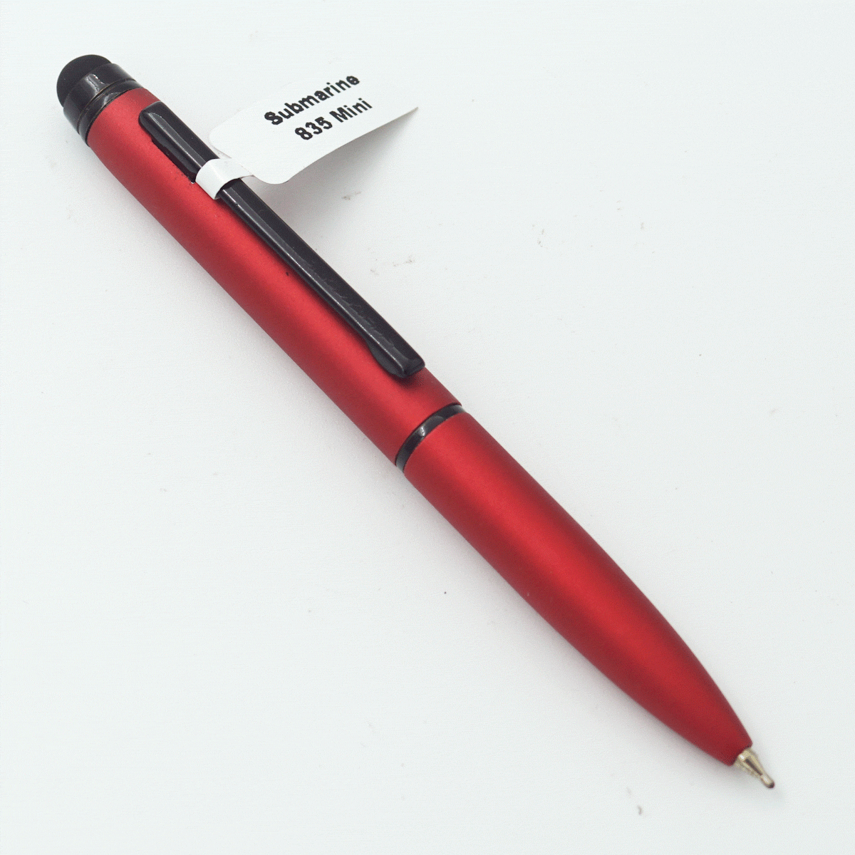 Submarine 835 Mini Mat Red Color Body With Red Color Cap On Stylus And Black Clip Fine Tip Twist Type Ball Pen SKU 23855