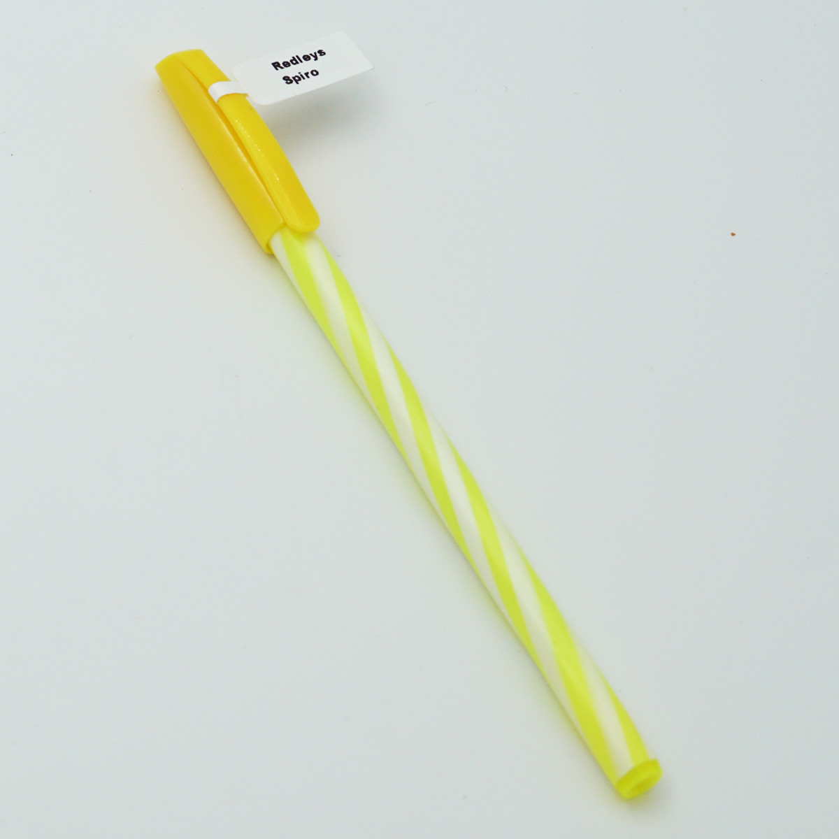 Ridleys Spiro 0.7 Yellow With White Color Body And Yellow Color Cap Blue Writing Cap Type Ball Pen SKU 23868