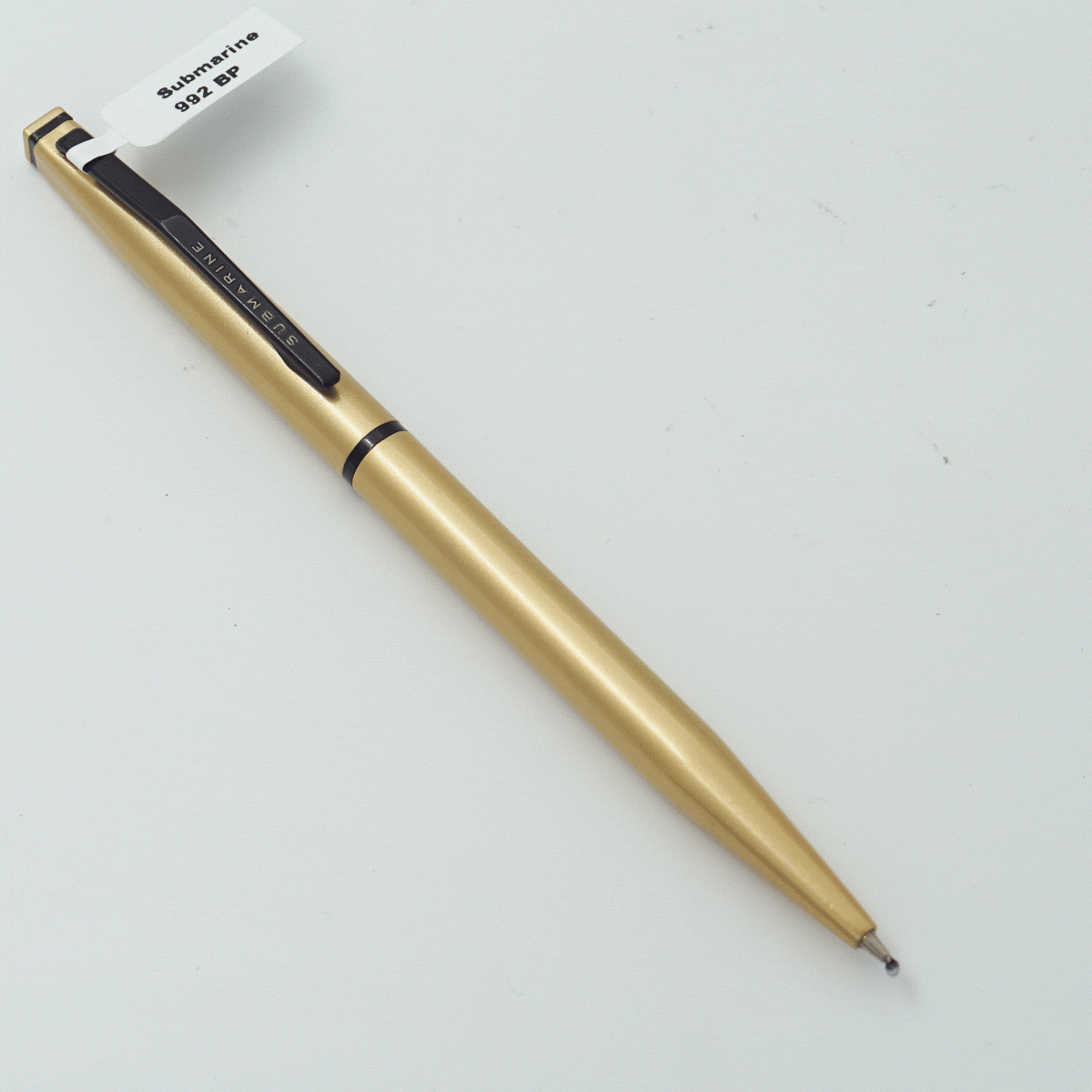Submarine 992 Golden Color Body With Gold Cap And Black Clip Twist Type Ball Pen SKU 23902