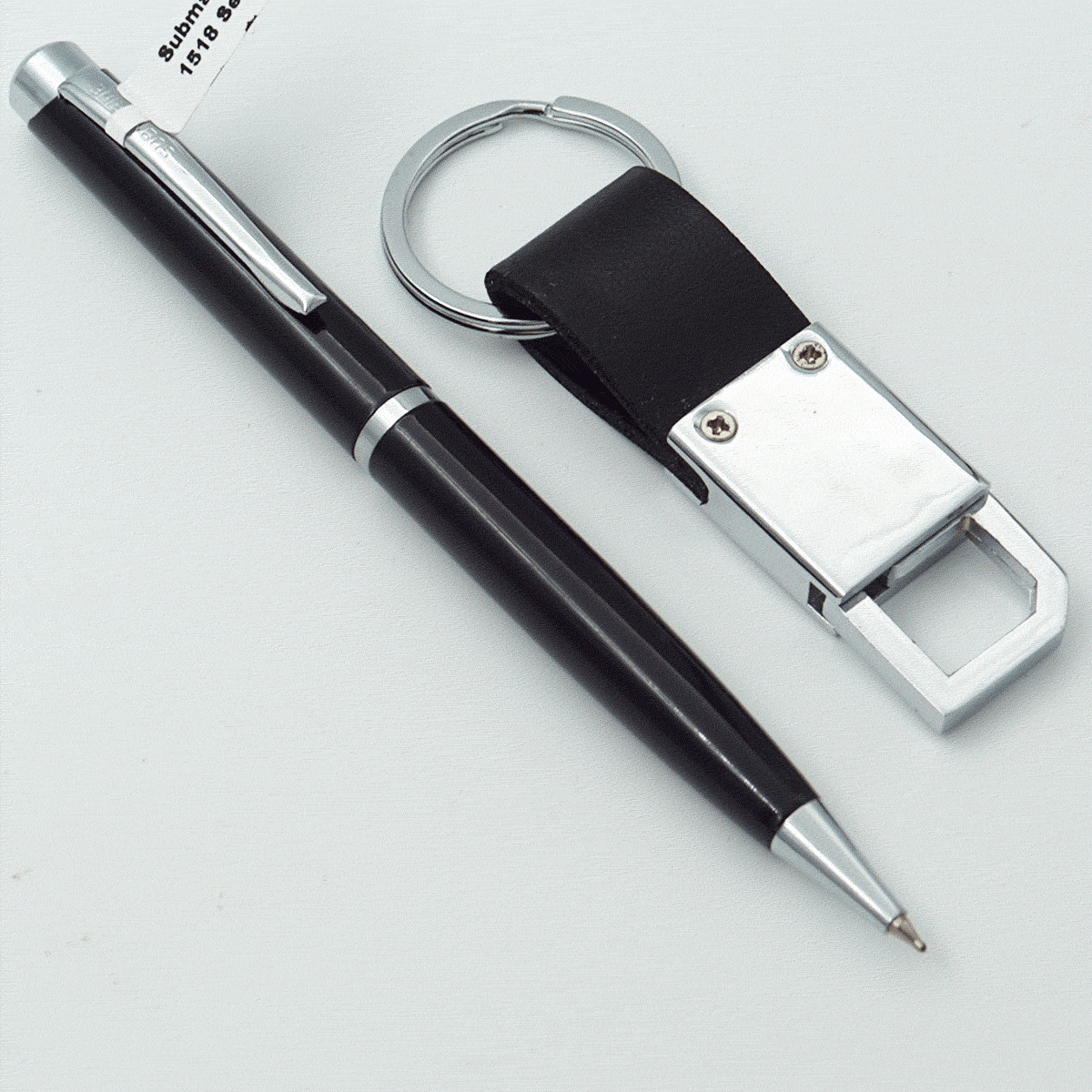 Submarine 1518 Black Color Body With Black Color Cap And Silver Clip Fine Tip Twist Type Ball Pen With Keychain Pen Set SKU 23928