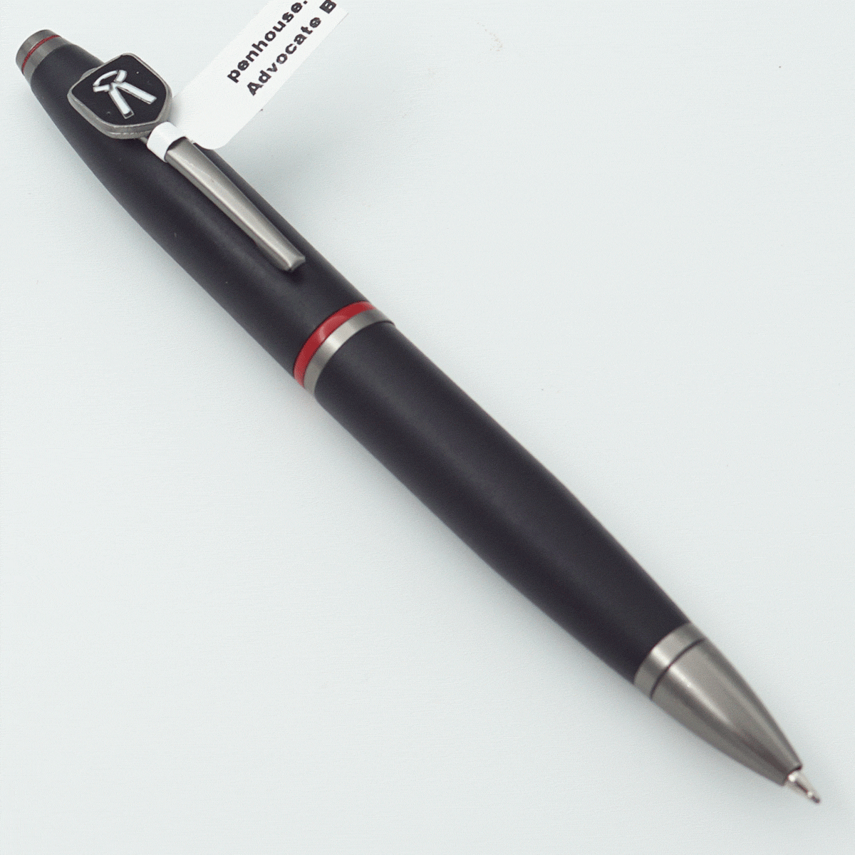 penhouse.in Mat Black Color Body With Black Color Cap And Red Trims Advocate Symbol On Clip Fine Tip Twist Type Ball Pen SKU 23948