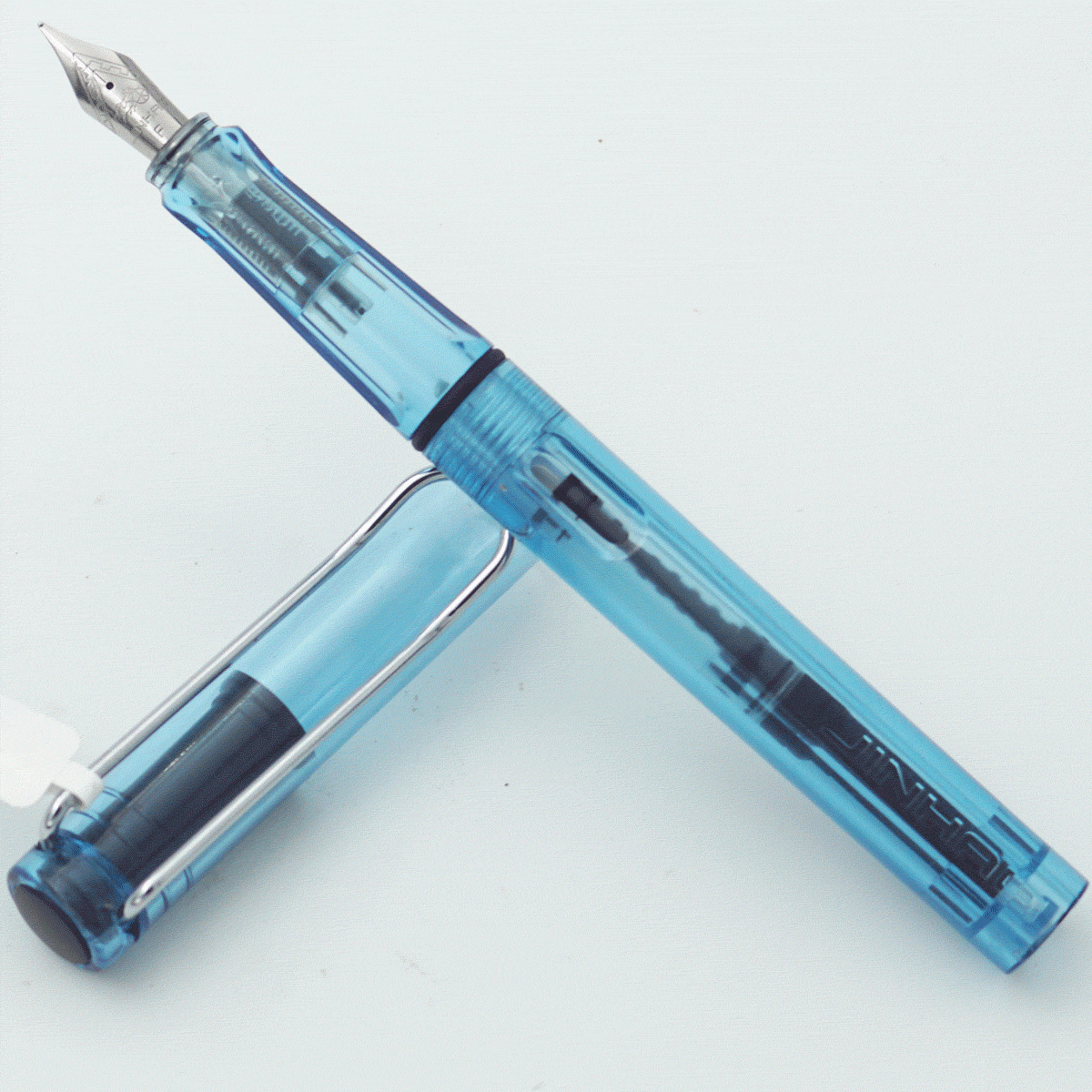 Jinhao Transparent Blue Color Body With Cap Fine Nib Converter Type Fountain Pen SKU 23996