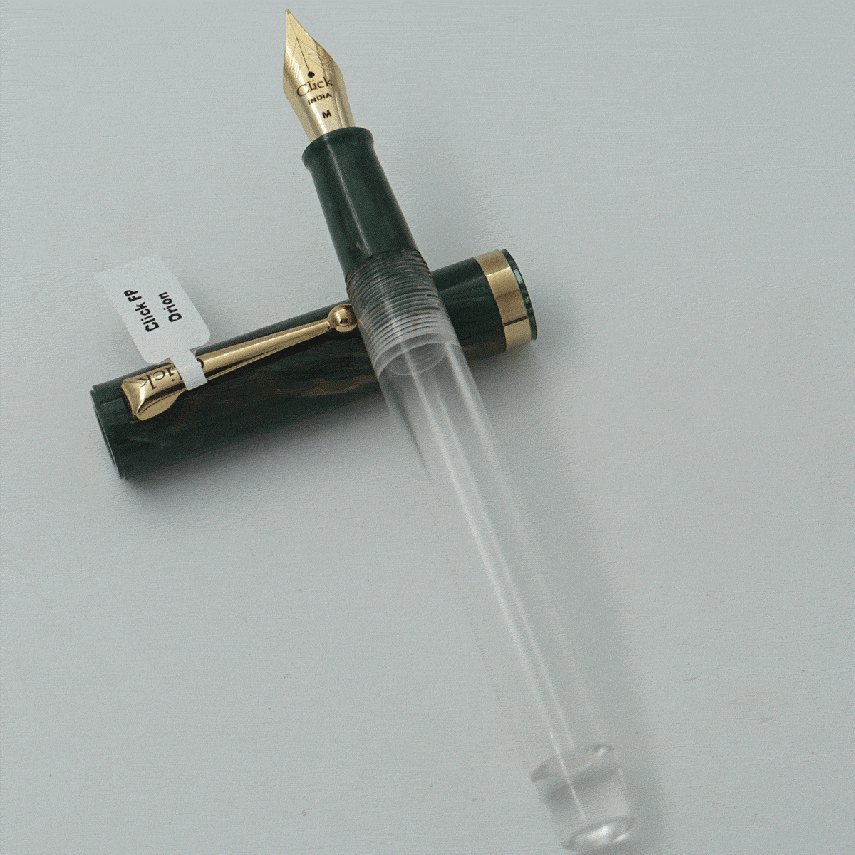 Click Orion Transparent Body With Green Color Marble Cap And Gold Clip No 35 GT Medium Nib Eye Dropper Model Fountain Pen (Nib Can be Customised) SKU 24135