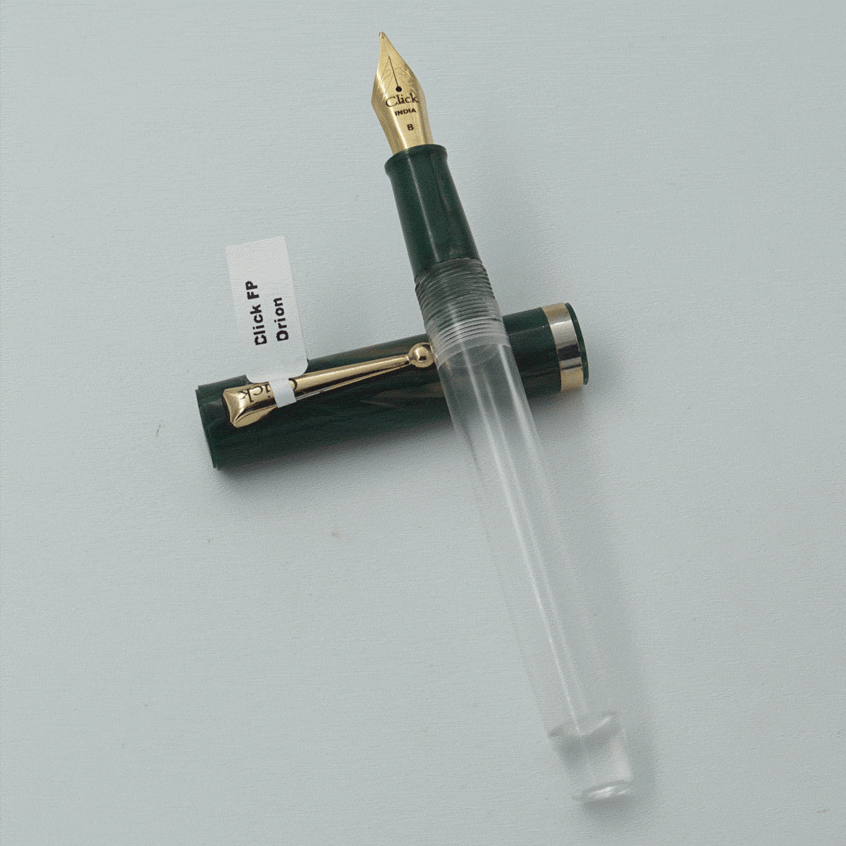 Click Orion Transparent Body With Green Color Marble Cap And Gold Clip No 35 GT Broad Nib Eye Dropper Model Fountain Pen (Nib Can be Customised) SKU 24136