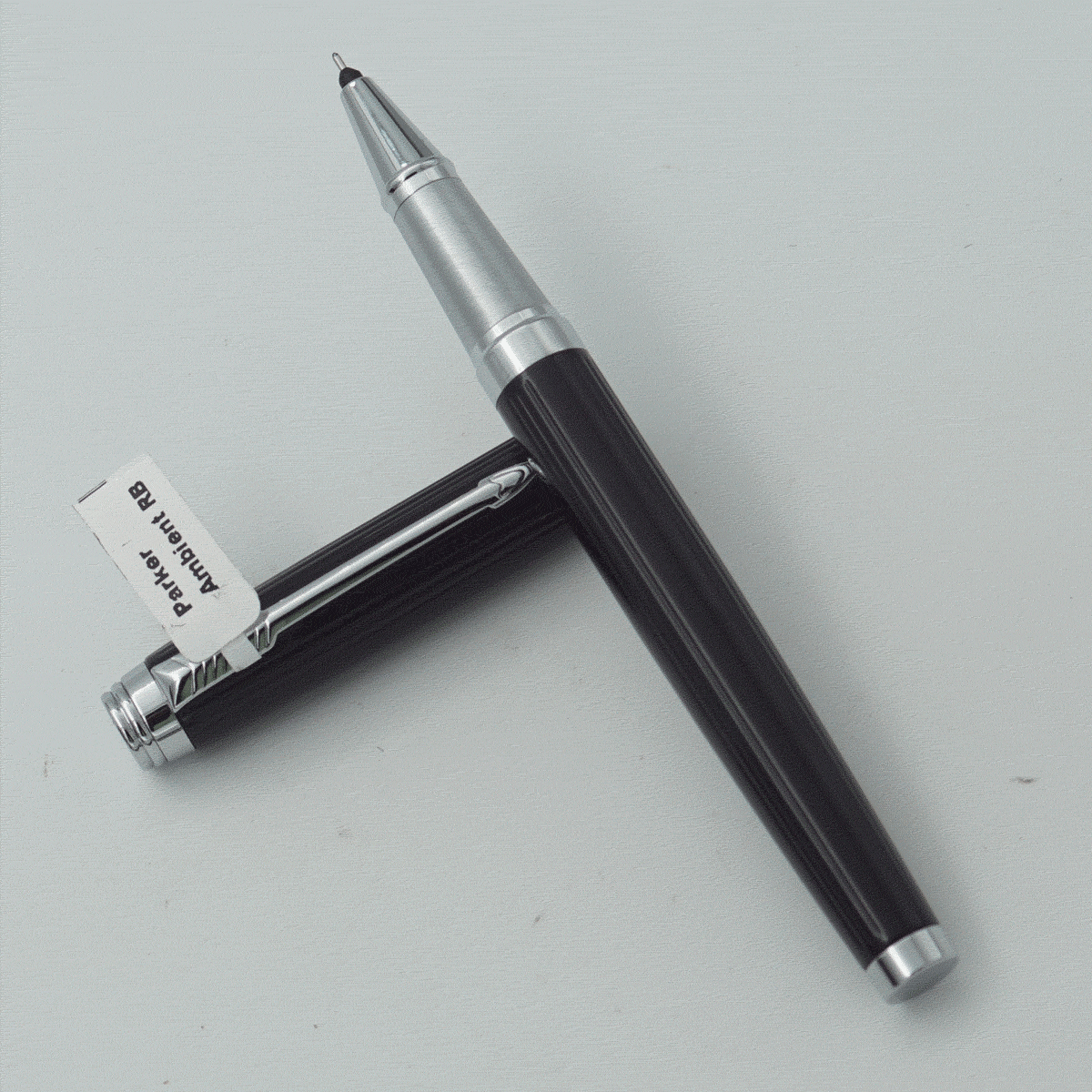 Parker Ambient Glossy Black Color Body With Cap And Silver Color Clip Fine Tip Roller Ball Pen SKU 24185