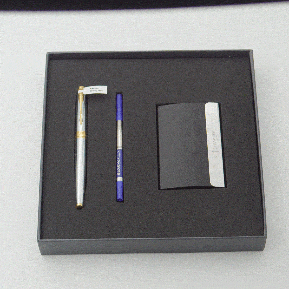 Parker Aster Shiny Silver Color Body With Gold Clip Ultra Fine Tip Roller Ball Pen With Card Holder Pen Set SKU 24194