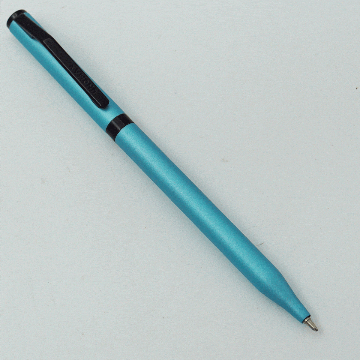Unomax MINT Sky Blue Color Body With Black Color Clip Fine Tip Twist Type Bal Pen SKU 24218