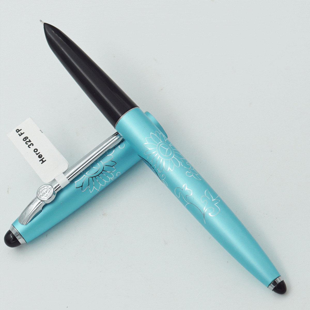 Hero 329 Blue Color Design Body With Cap And Silver Clip Fine Nib Rubbersac Model Fountain Pen SKU 24240