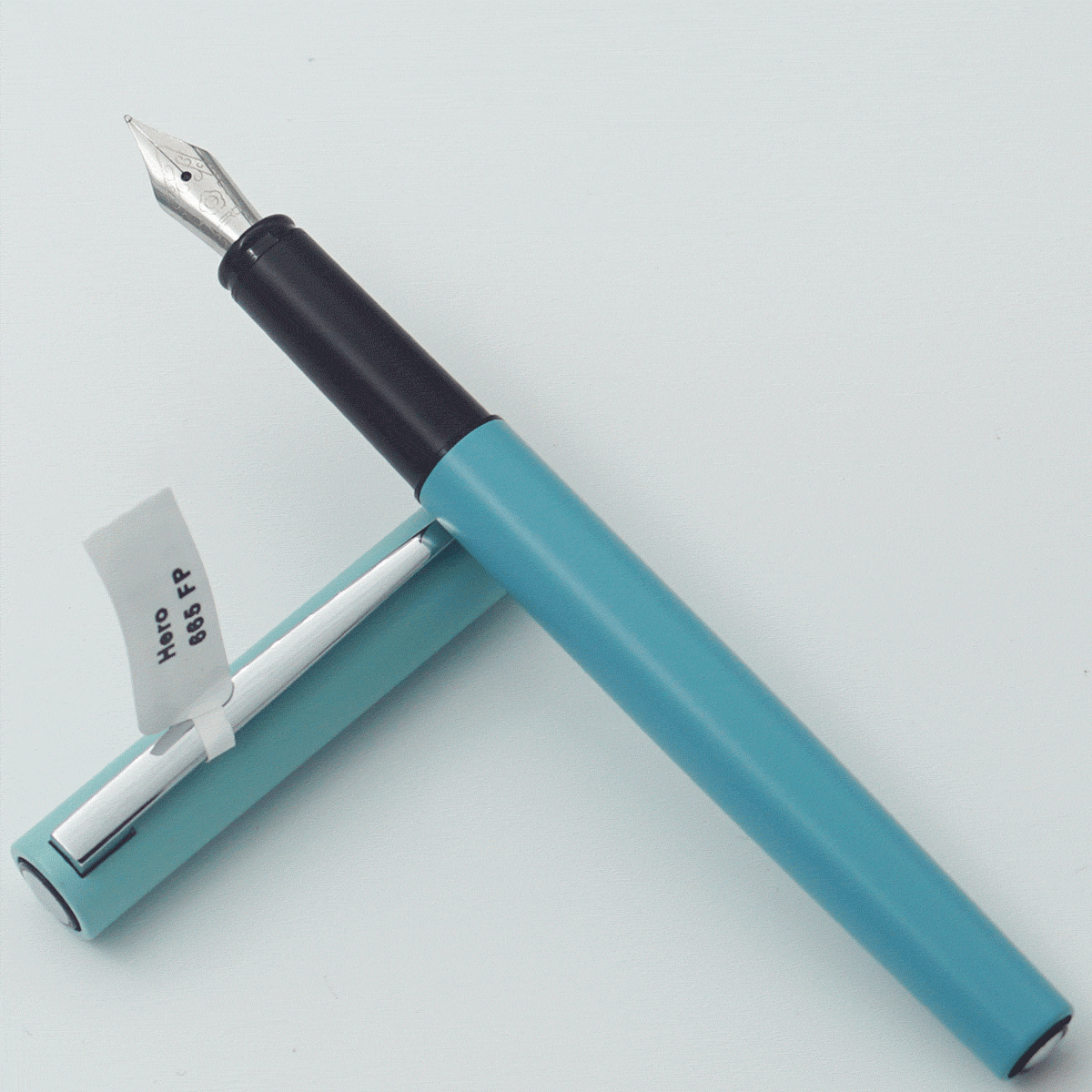 Hero 665 Sky Blue Color Body With Silver Color Clip Fine Nib Converter Type Fountain Pen SKU 24386