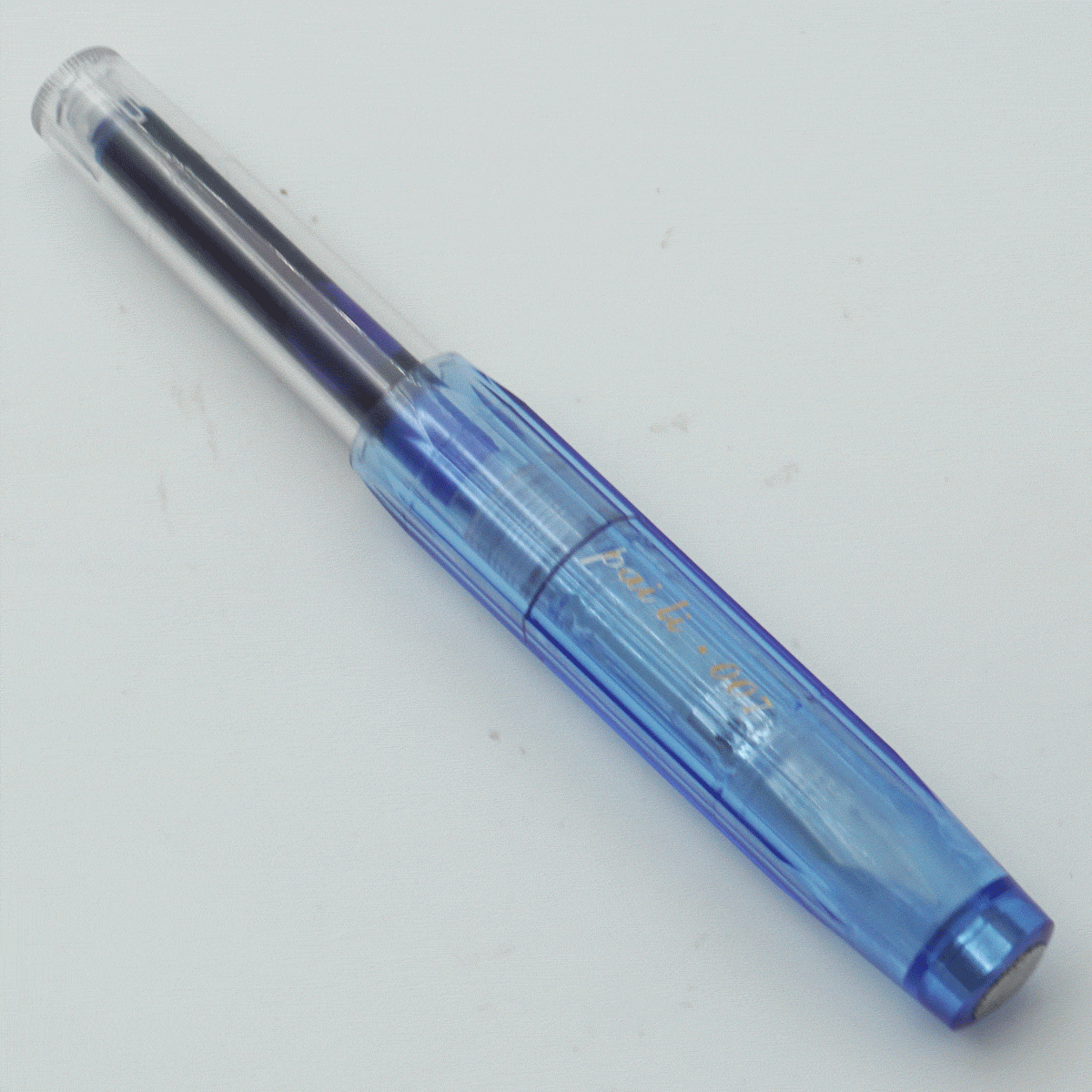 Ledos Paili 007 Tranparent Body With Blue Color Long Cap Fine Nib Cartridge Type Fountain Pen SKU 24420