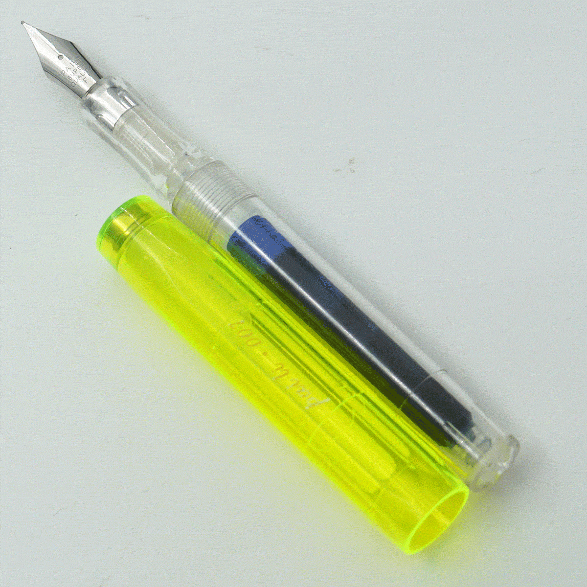 Ledos Paili 007 Tranparent Body With Yellow Color Long Cap Fine Nib Cartridge Type Fountain Pen SKU 24421