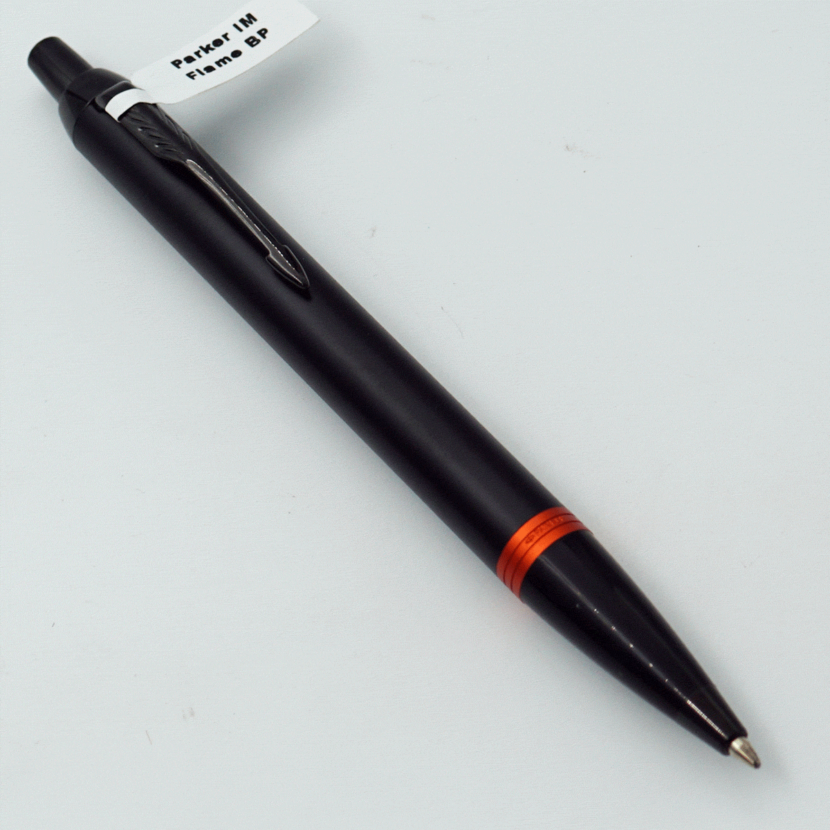 Parker IM Flame Black Color Body With Orange Trims And Black Clip Medium Tip Retractable Type Ball Pen SKU 24502