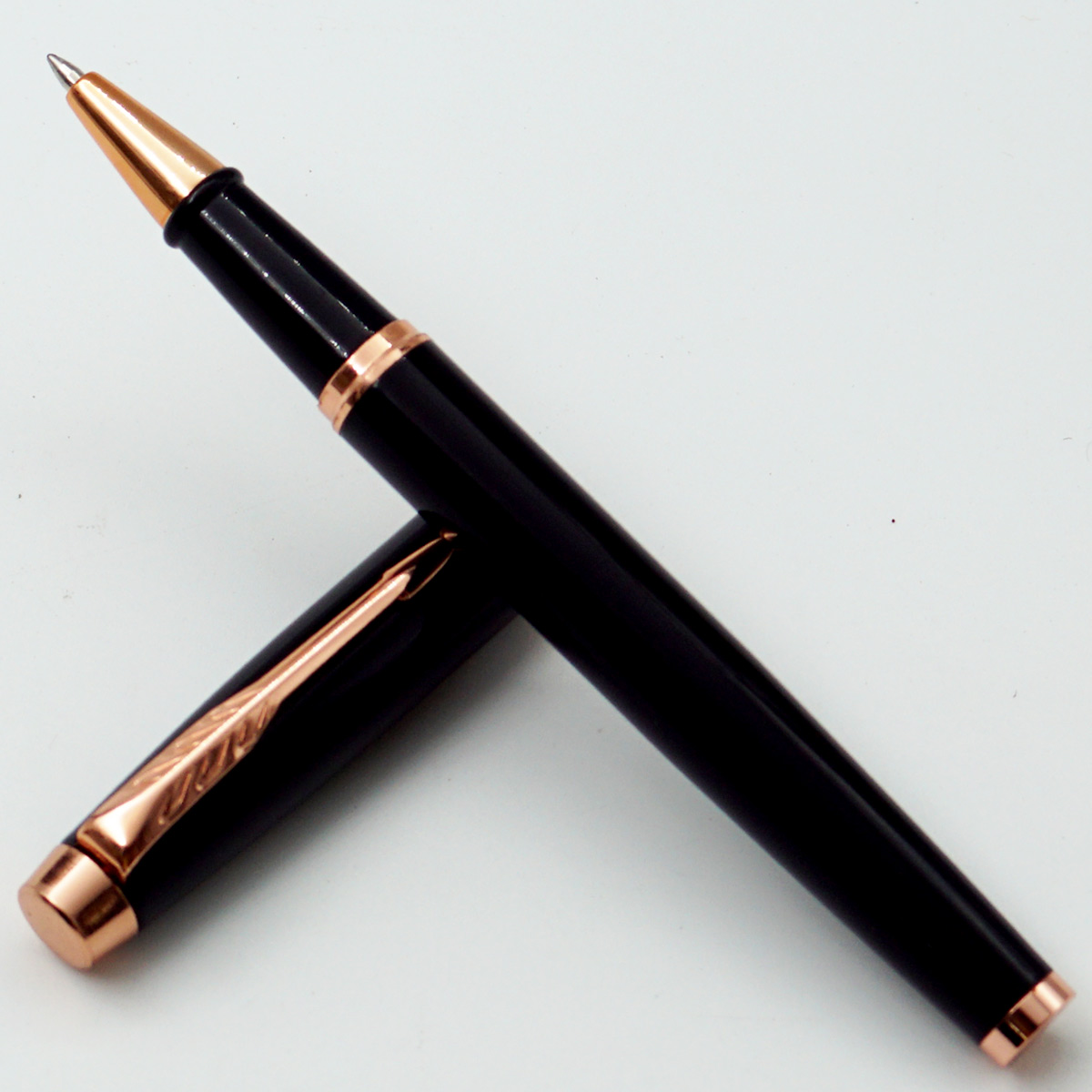 penhouse.in Glossy Black Color Body With Copper Color Clip Medium Tip Roller Ball Pen SKU24606
