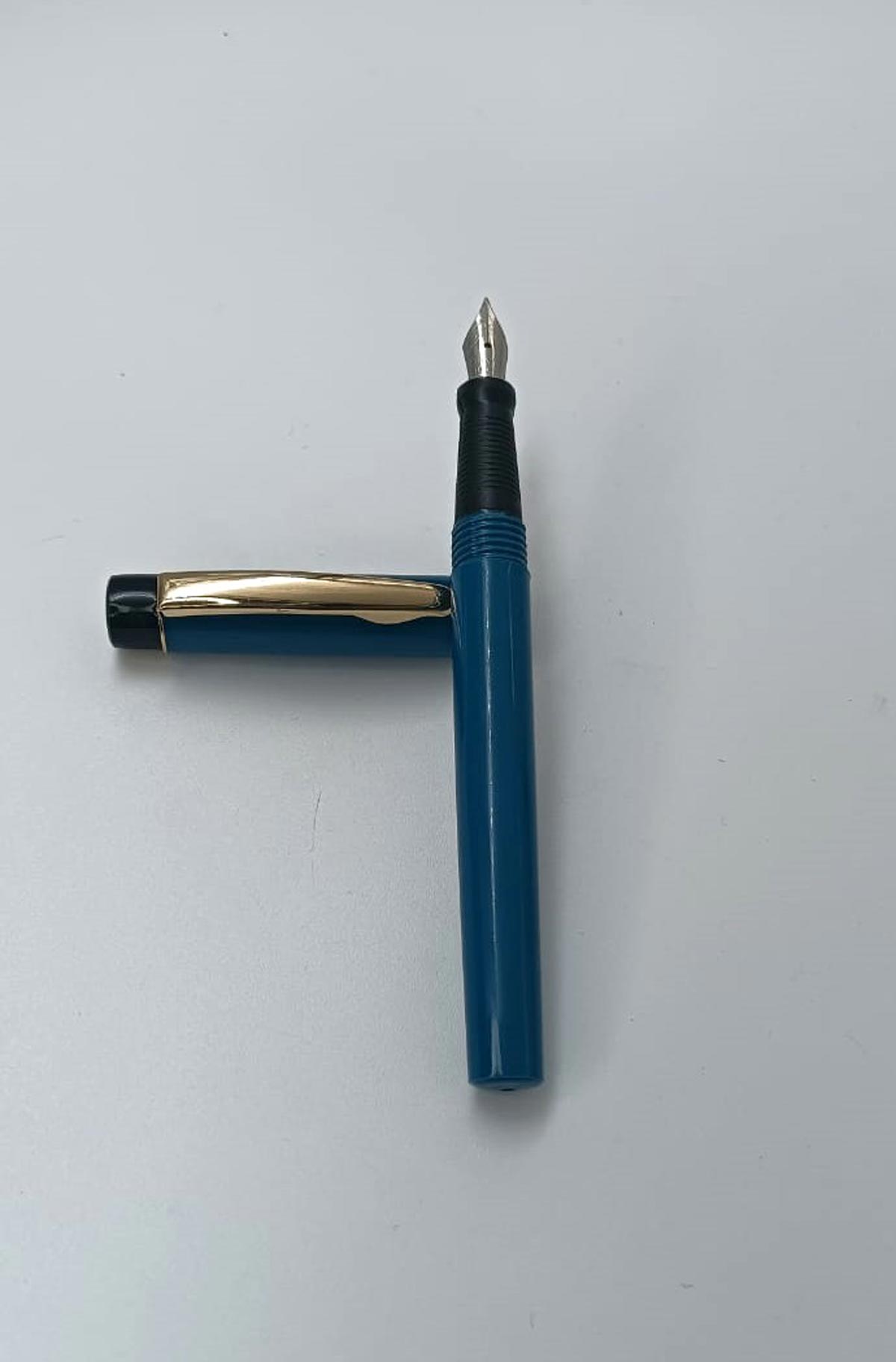 Oliver 05 Turquoise Blue Color Body With Gold Trim Fine Nib Eye Dropper Model Fountain Pen  SKU 24917