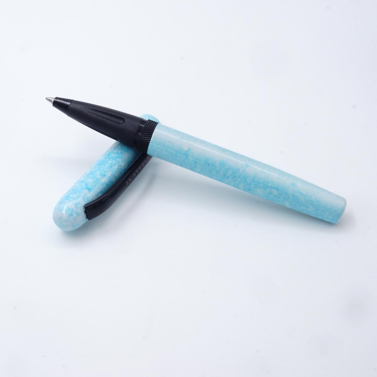 Submarine 910 White with Sky Blue Color Design Body With Black Color Clip Medium Tip Roller Ball Pen SKU 24959