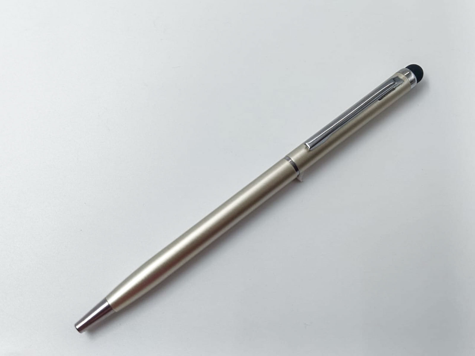penhouse.in Slim Glossy Finish Half Gold Color  Body  With Silver Trim  Medium Tip Stylus Twist Type Ball Pen SKU 24976