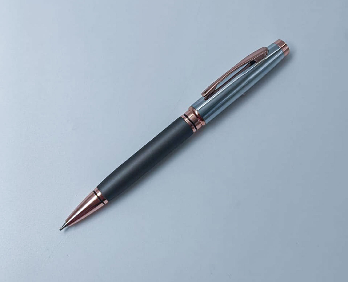 Penhouse.in Silver With Grey Color body And Copper Trim Twist Type Ball Pen  SKU 24977