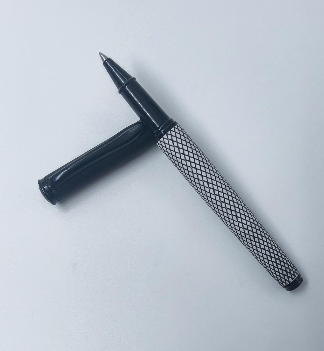 Penhouse.in  Matt Black Color Checked Body With Black Color Cap Roller Ball Pen  SKU 24990