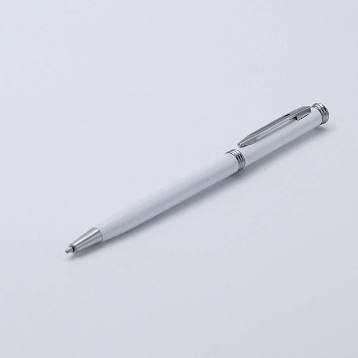 penhouse.in White Color Slim  Body With Silver Clip And Trim Medium Tip Twist Type Ball Pen  SKU 25124