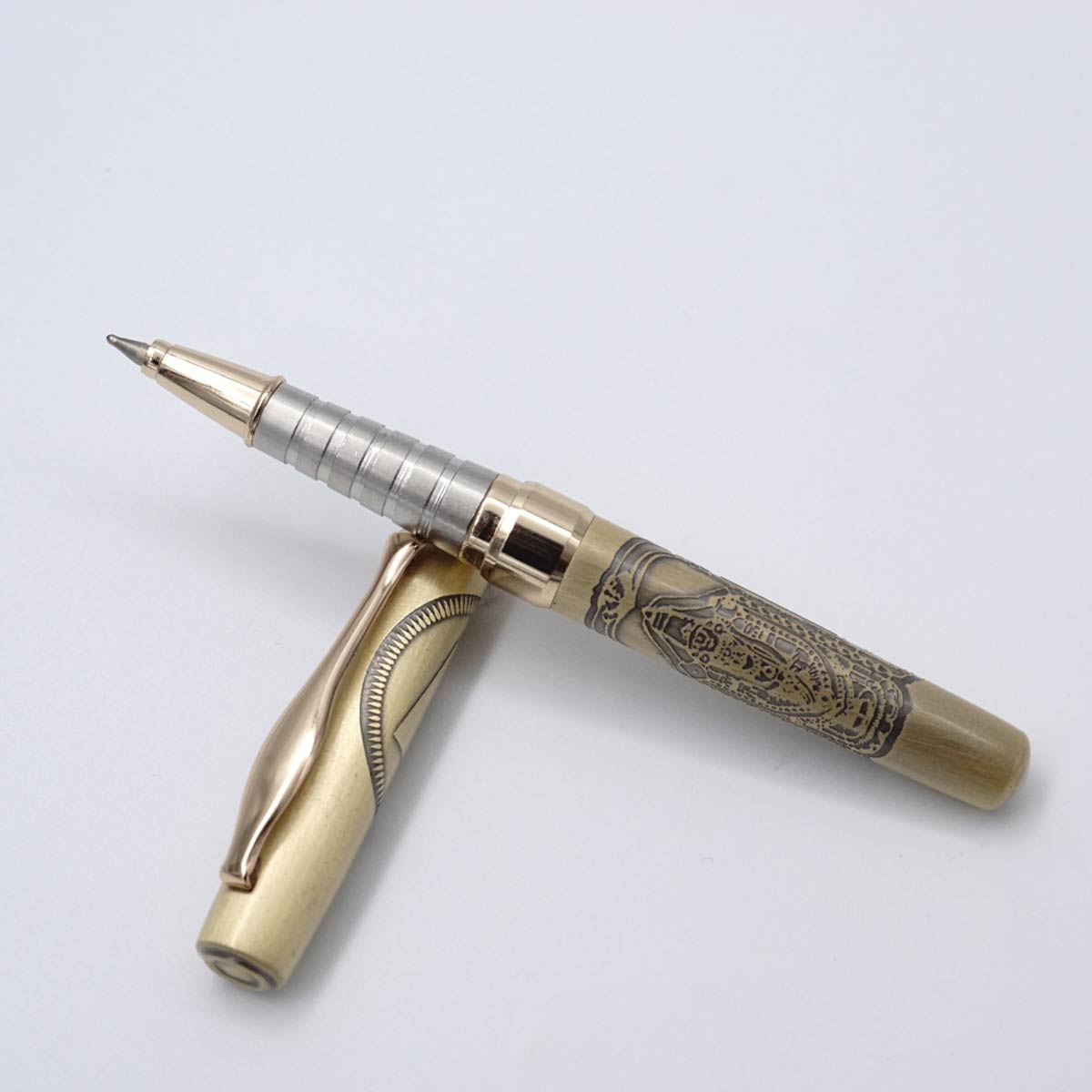 Penhouse.in Golden Color Body With Golden Clip And Trim Perumal Design Fine Tip Short Cap Type  Ball Pen  SKU 25134