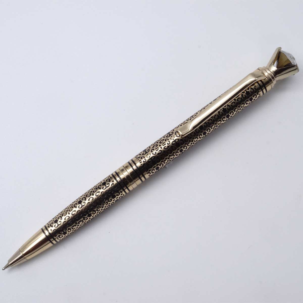 Penhouse.in Full Golden Designed Top on Stone Twist Type Ball Pen SKU 25167