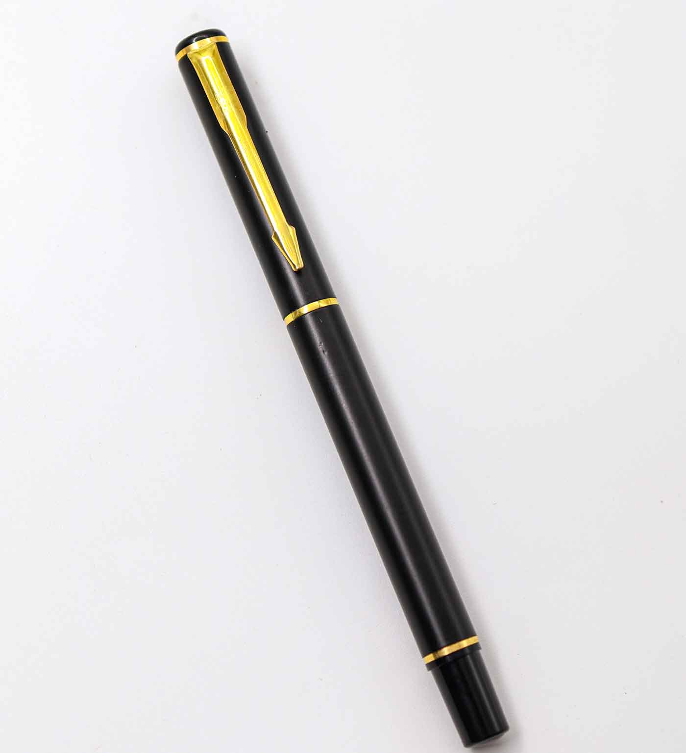 Penhouse.in Matt Black Body With Golden Clip And Trim Medium Tip Cap Type Roller Ball Pen SKU 25186