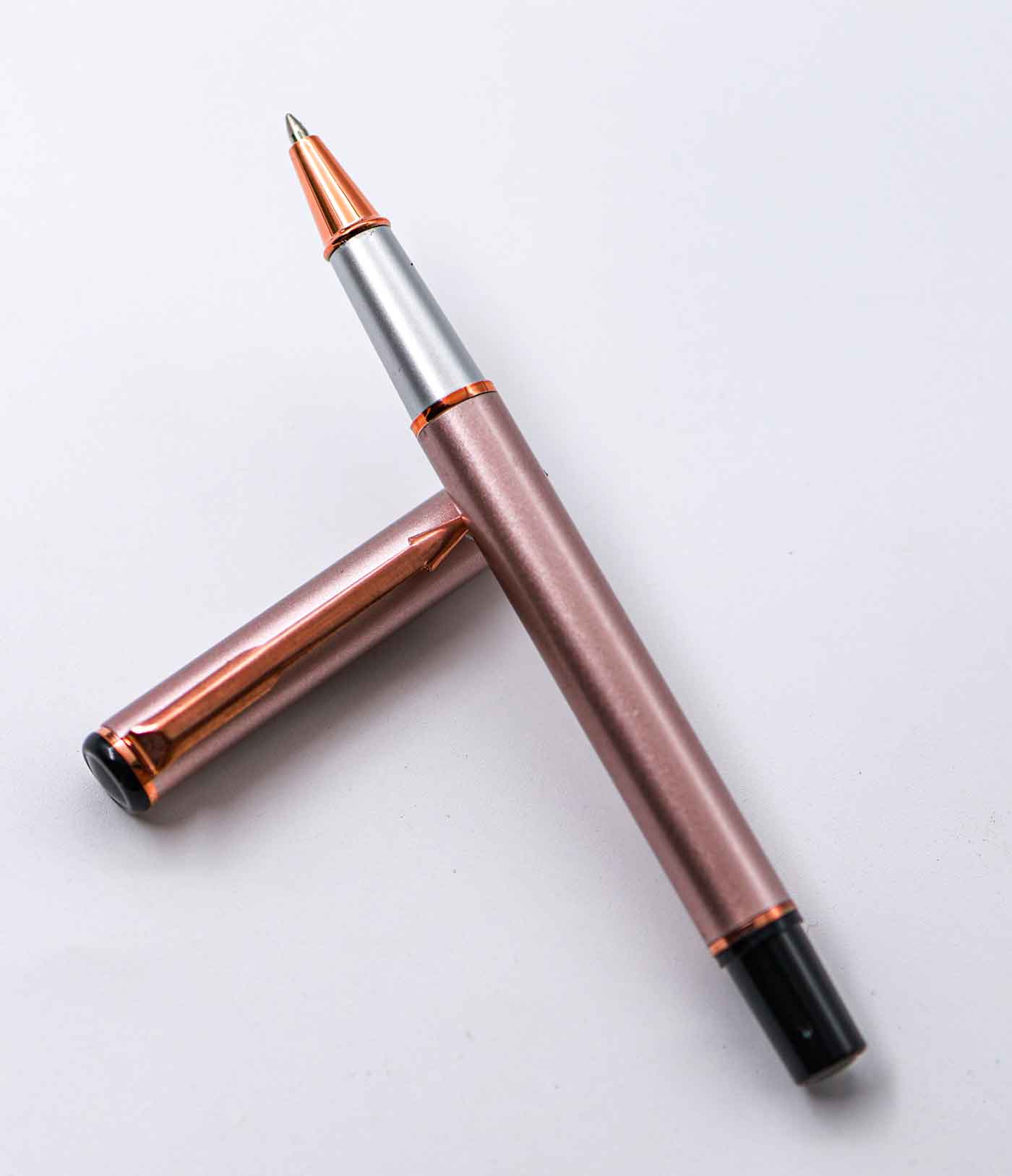 Penhouse.in Rose Gold Body With Golden Clip And Trim Medium Tip Roller Ball Pen SKU 25191