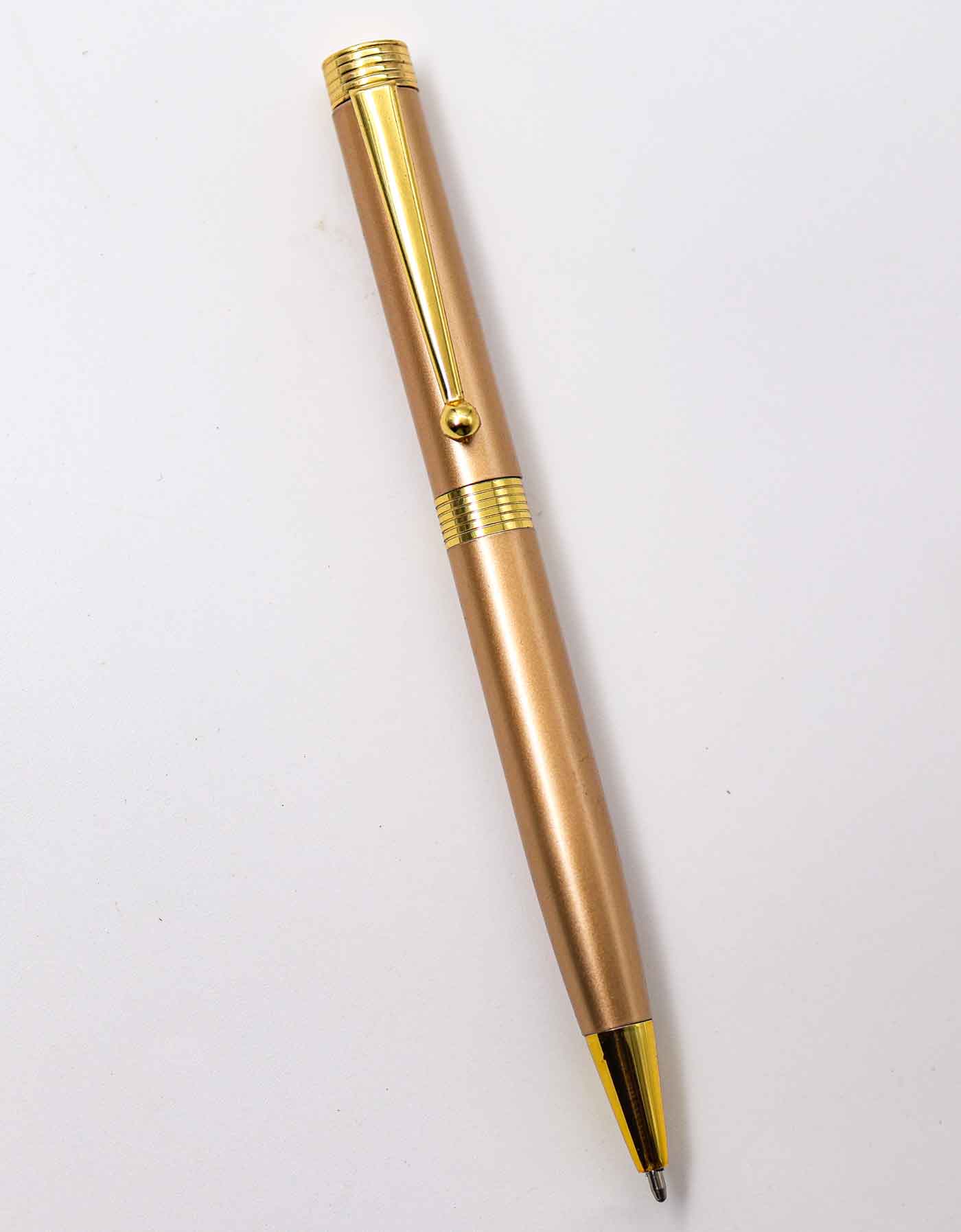 Penhouse.in Light Gold Body With Golden Clip And Trim Medium Tip Twist Type Ball Pen SKU 25192