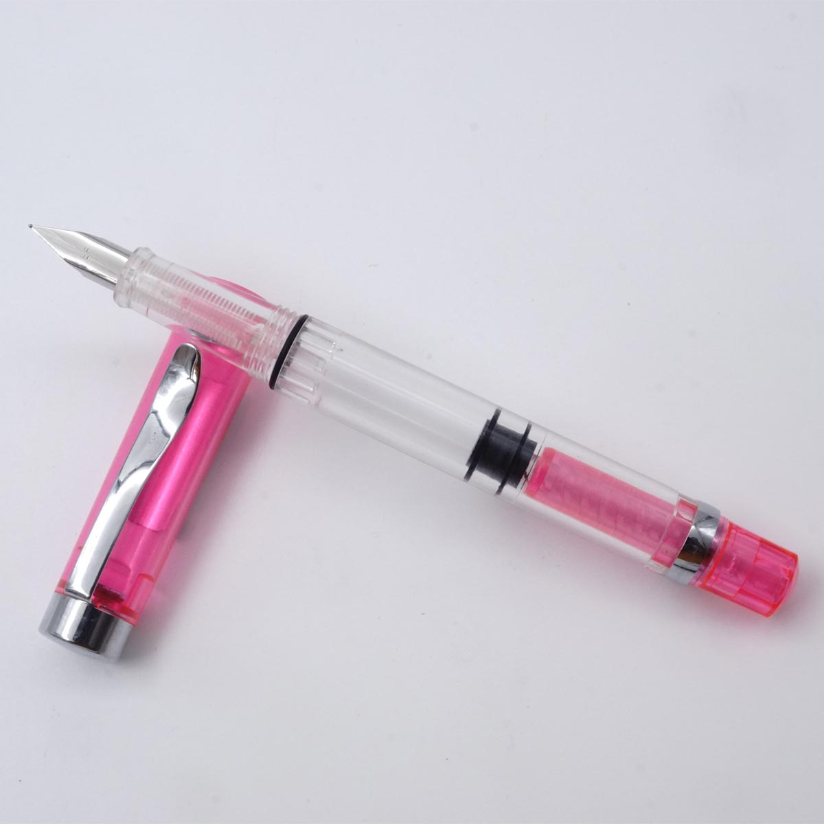 Luoshi 360A Transparent Pink Color Body With Silver Clip EF Nib Piston Type Fountain Pen SKU 25200 