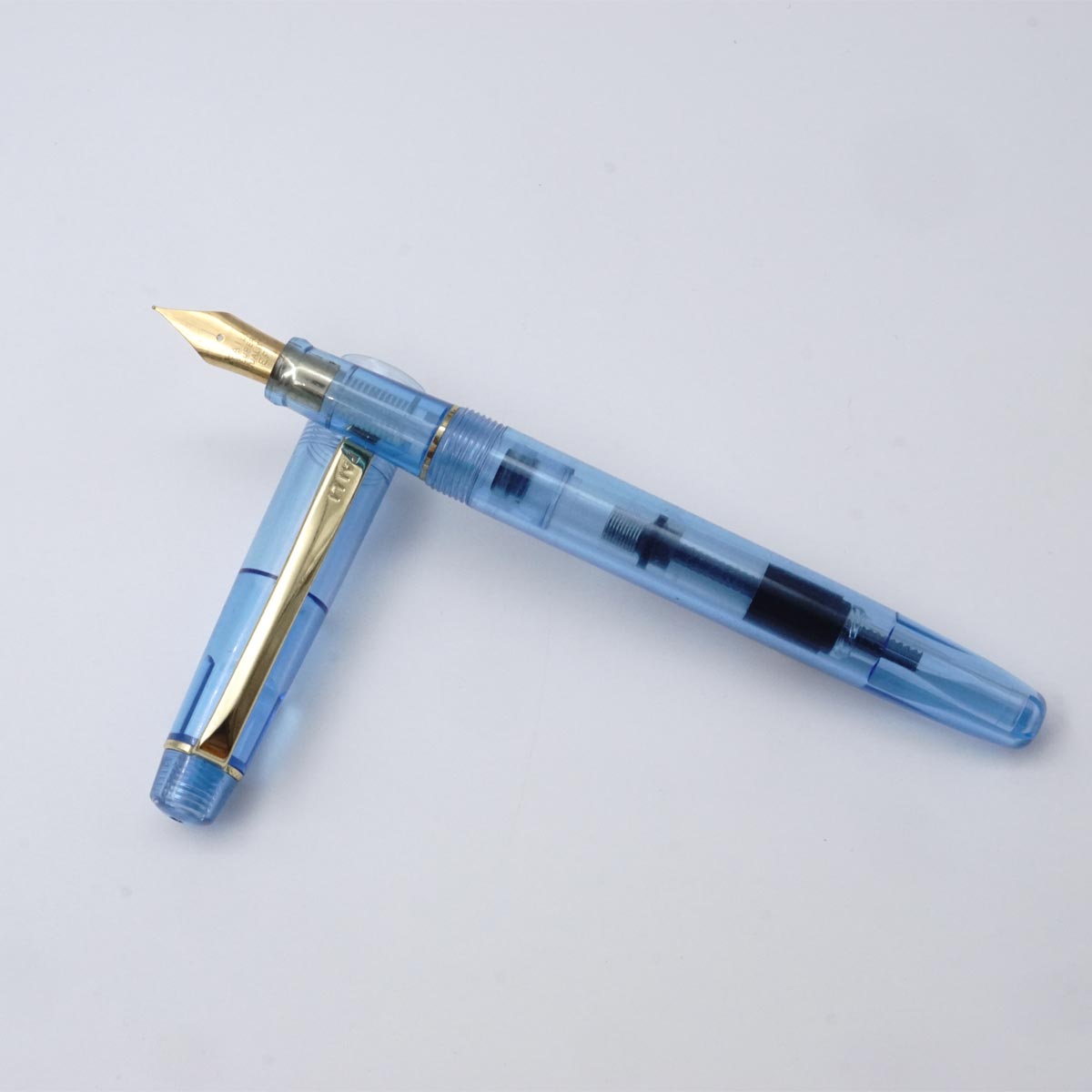 Paili 002 Transparent Blue EF Nib Gold Clip And Trim Converter Type  Fountain Pen SKU 25206