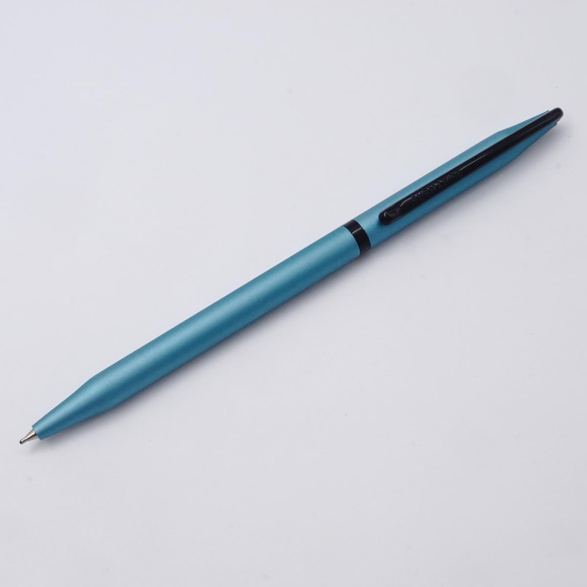Submarine 989 Slim Turquoise Blue Color Body Black Clip And Trim Twist Type Ball Pen SKU 25463