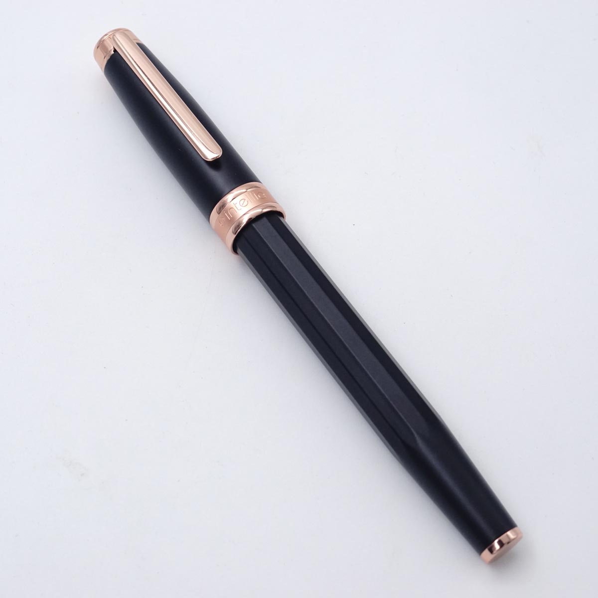 Intellio Mystique Model Matte Black Body With Rose Gold Trim And Clip Brass Material Medium Nib Converter Type Fountain Pen SKU 25484