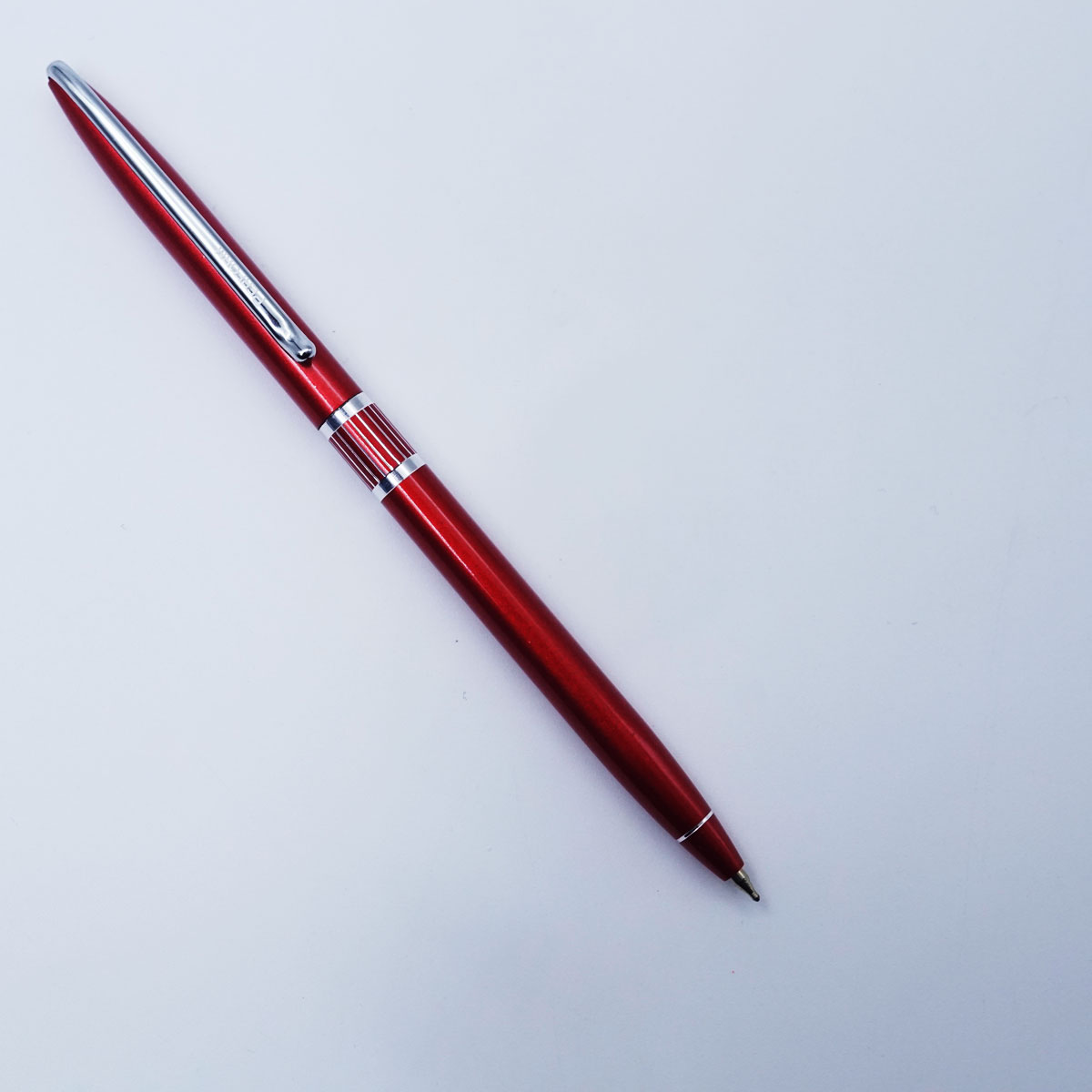 Perform SPUR Point Premium Red And Silver Solid Body Chrome Plated Twist Type Ball Pen  SKU 26153