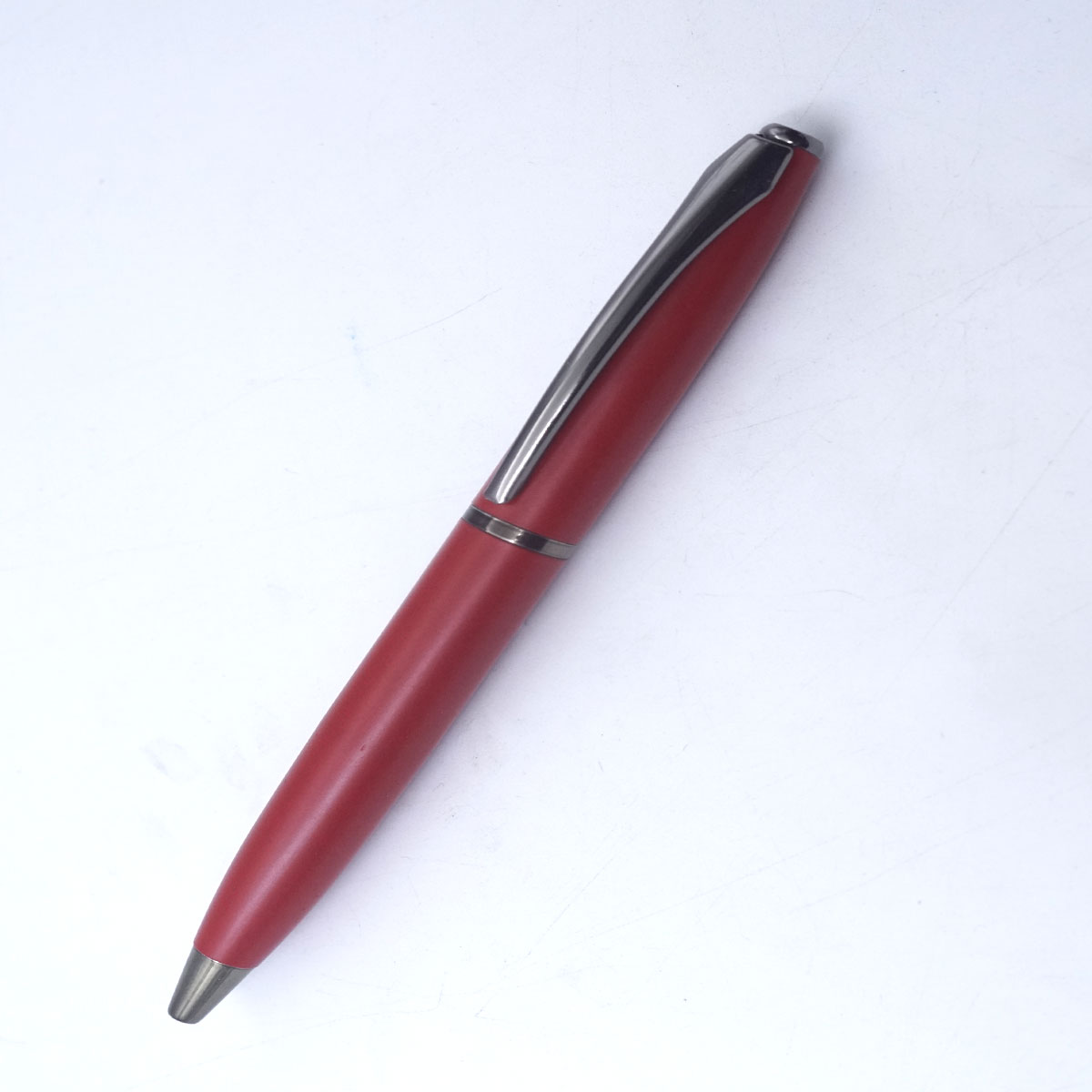 penhouse.in 909 matt Red Color  Silver Clip Twist Type Medium Nib Ball Pen SKU 26567