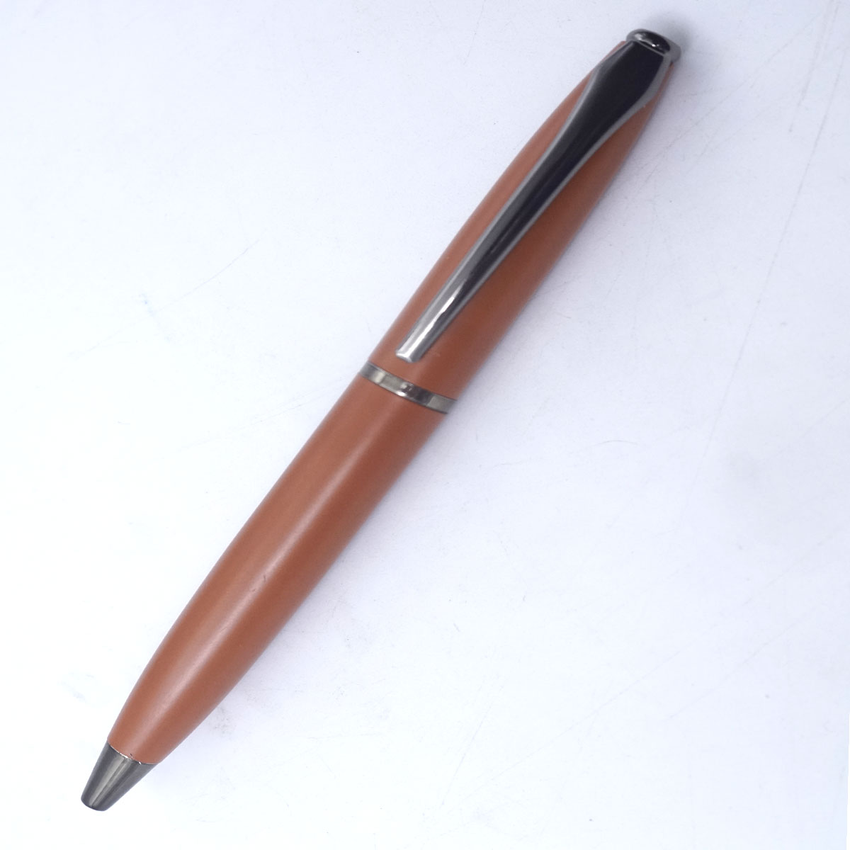 penhouse.in 909 matt Orange Color  Silver Clip Twist Type Medium Nib Ball Pen SKU 26565