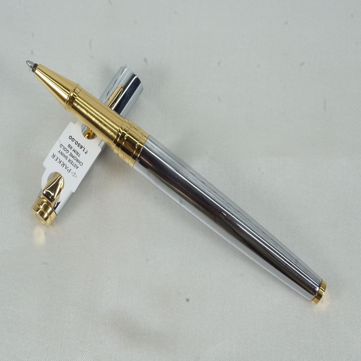 Parker Luxor Aster Shiny Chrome  Silver Color With Gold Clip  Medium Tip Roller Ball Pen SKU 27310