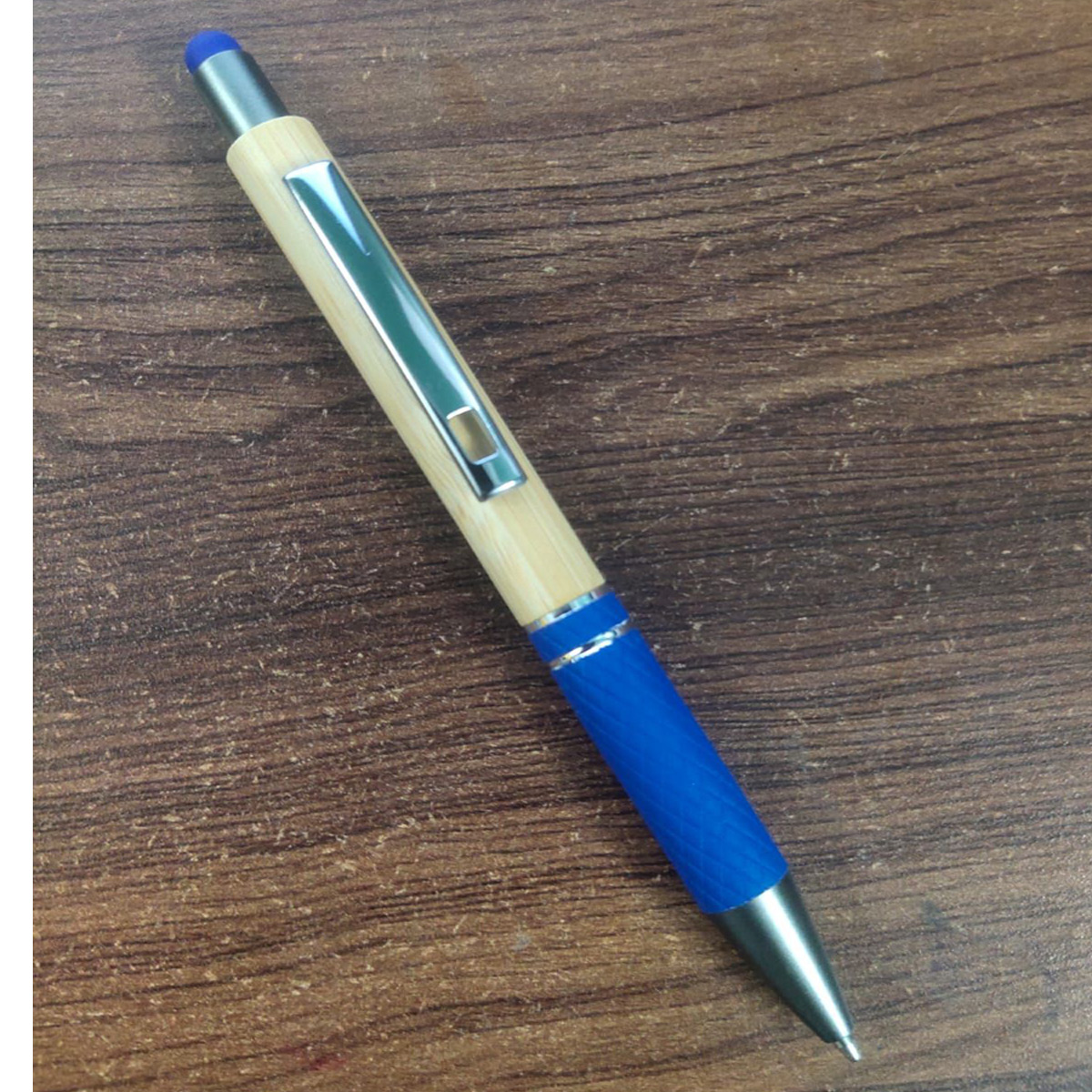 Penhouse.in Wood Color Body With Blue Grip Retractable Type Ball Pen SKU 27476