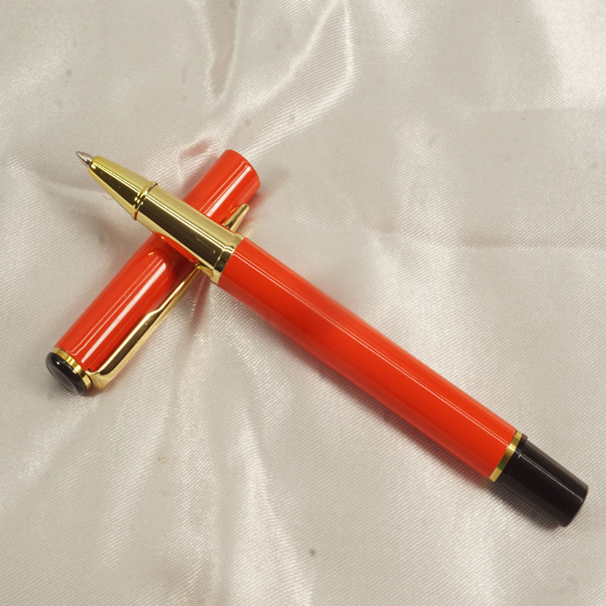 penhouse.in Orange Color Body With Gold Clip And Grip Cap Roller Ball Pen SKU 27625
