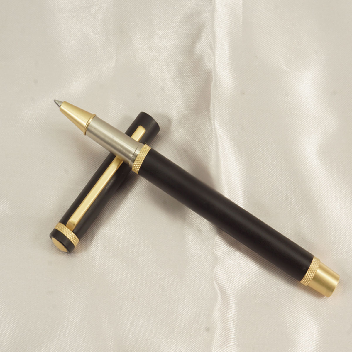 penhouse.in Matte Black Color Body With Gold Clip And Trim Roller Ball Pen SKU 27626