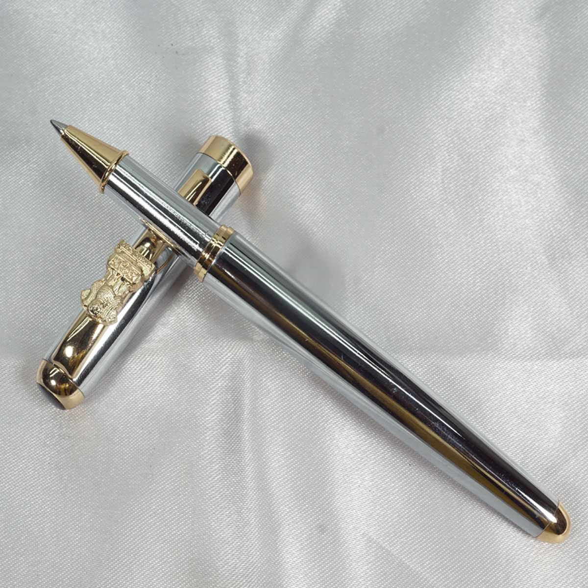 penhouse.in Glossy Silver Color Body With Gold Ashoka  Emblem On Clip Fine Tip Roller Ball Pen SKU 27742