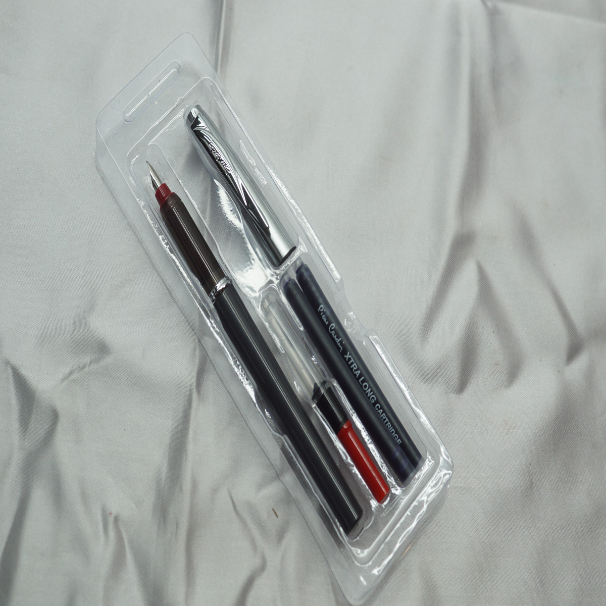 Pierre Cardin Penomatic Metal Grey Color Body with Silver Color Cap With Red color nib section fine tip with free cartridge & converter cap type fountain pen SKU 27969