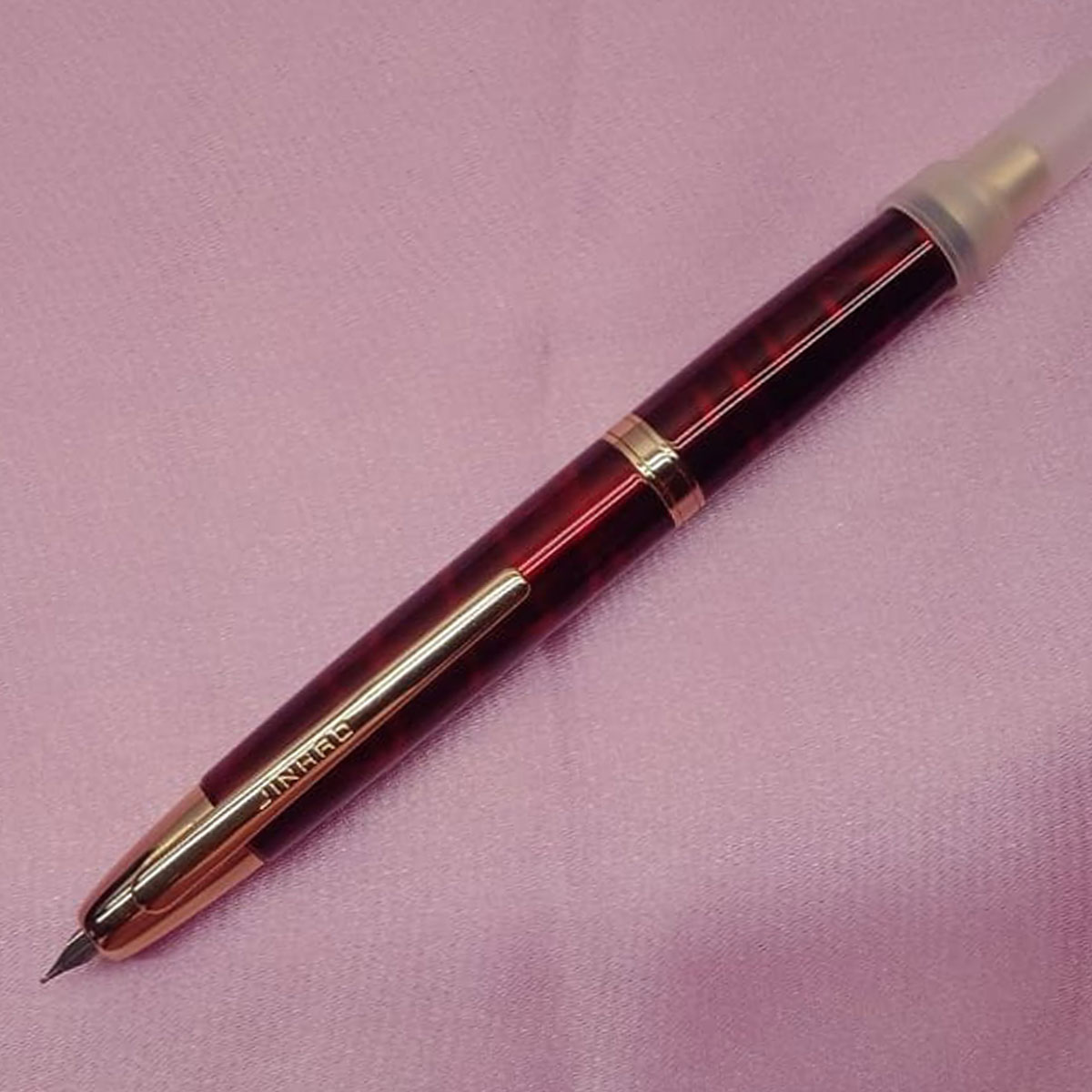 Jinhao 10 Black With Red Marble Color Body With Gold Clip Fine Nib Retractable Type Fountain Pen SKU 28051