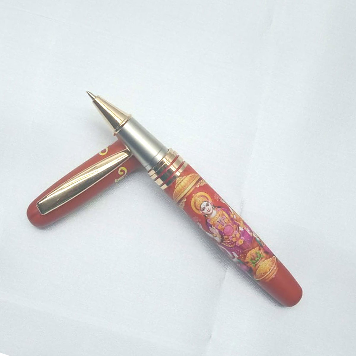 penhouse.in  Red Color Body Lakshmi Ganesh And Saraswathi Design Printed Ball Pen SKU 28077